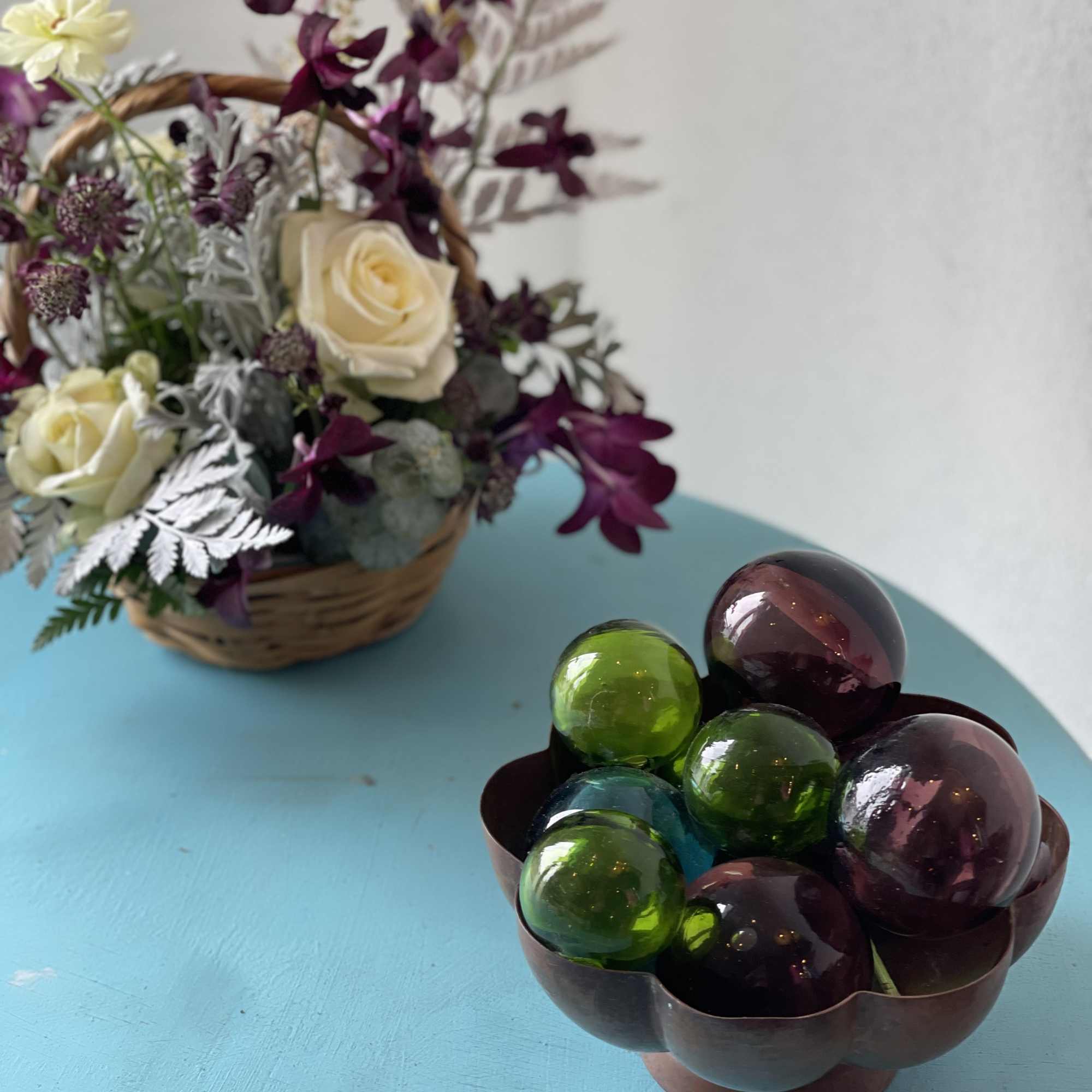 Dark purples, partnered with cream and white blooms. This exotic twist play
