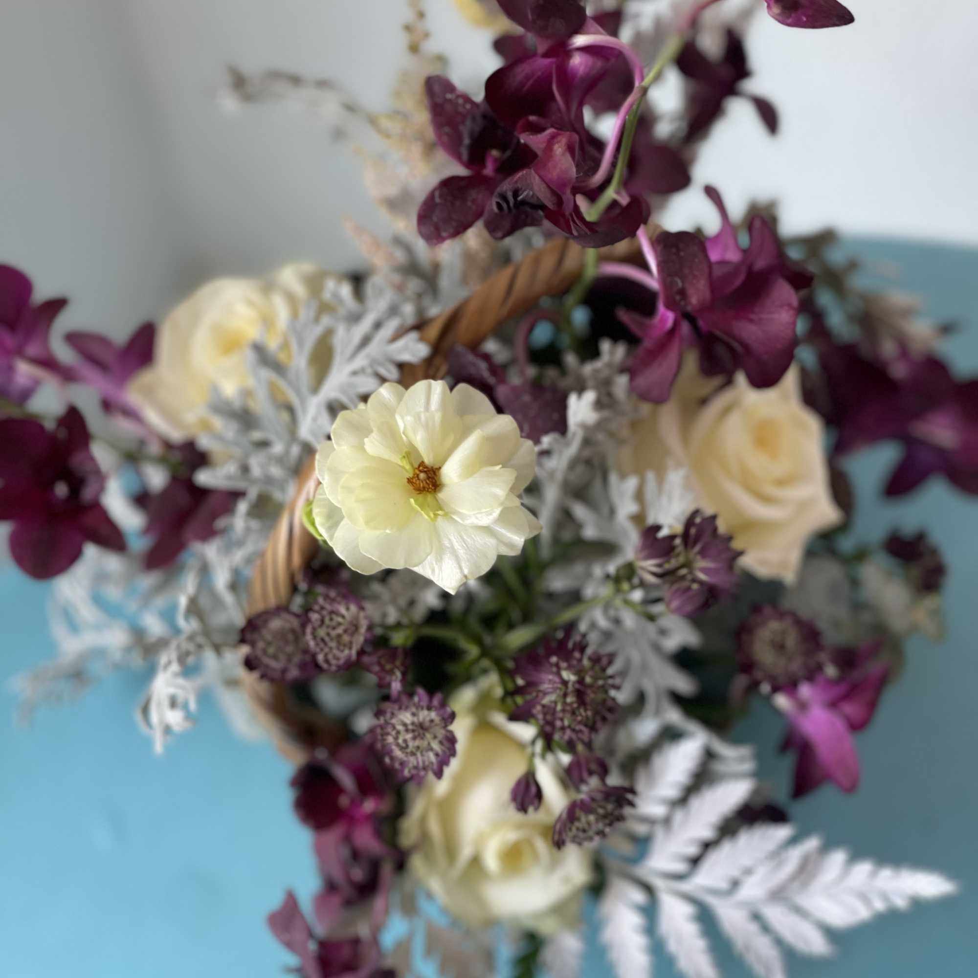 Dark purples, partnered with cream and white blooms. This exotic twist play