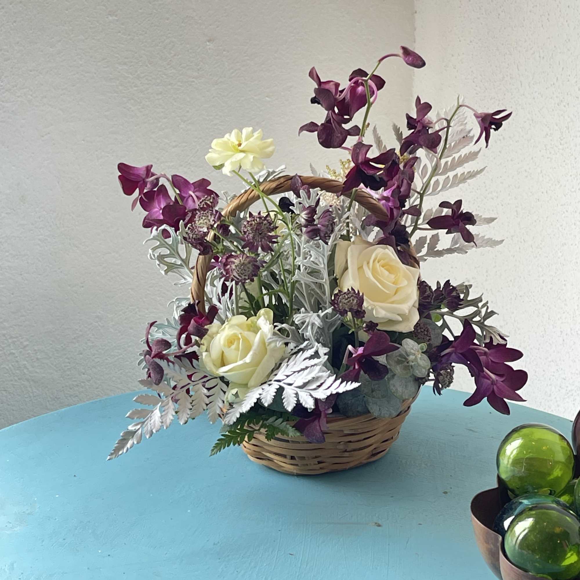 Dark purples, partnered with cream and white blooms. This exotic twist play