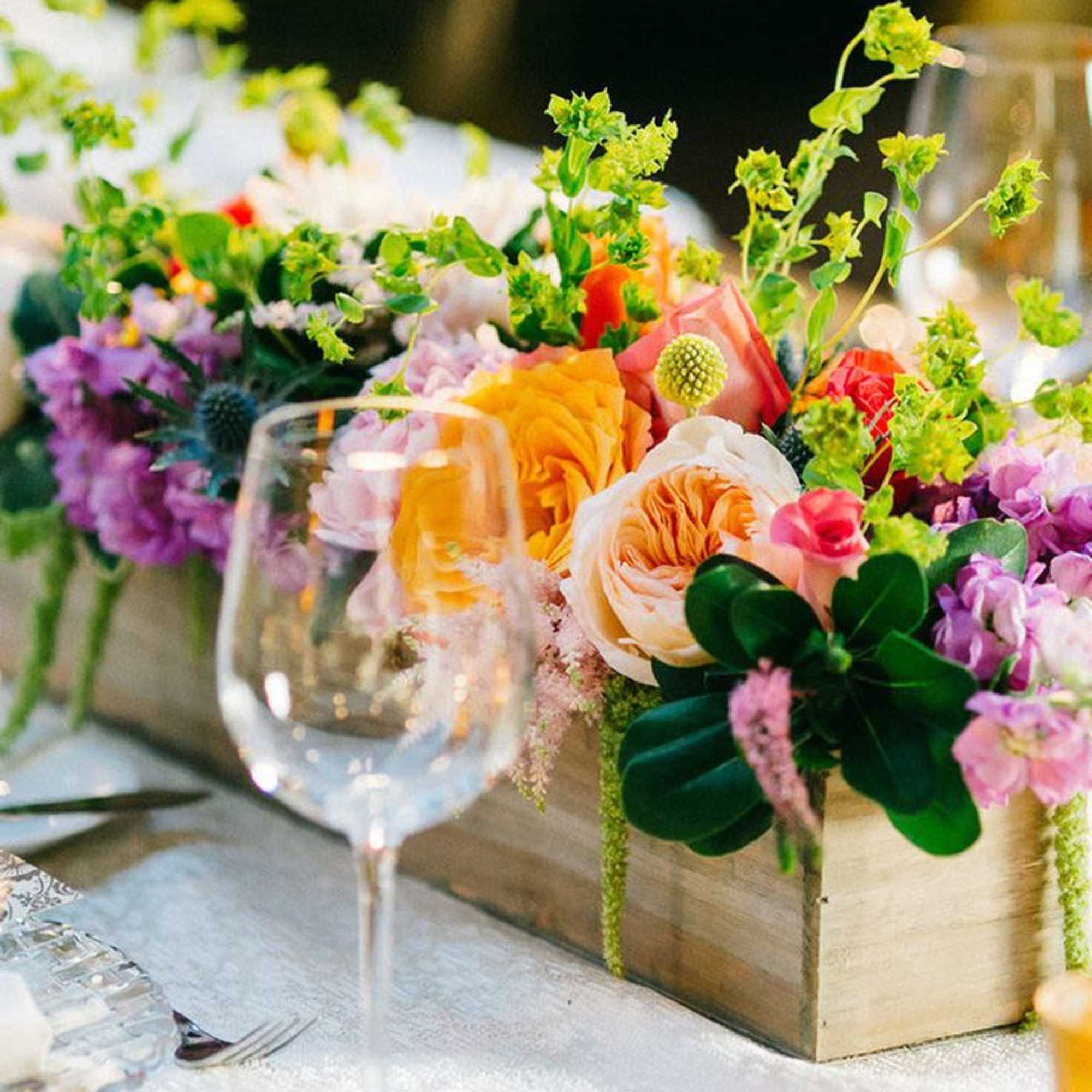 This beautiful display of tropical florals  This floral arrangement with a