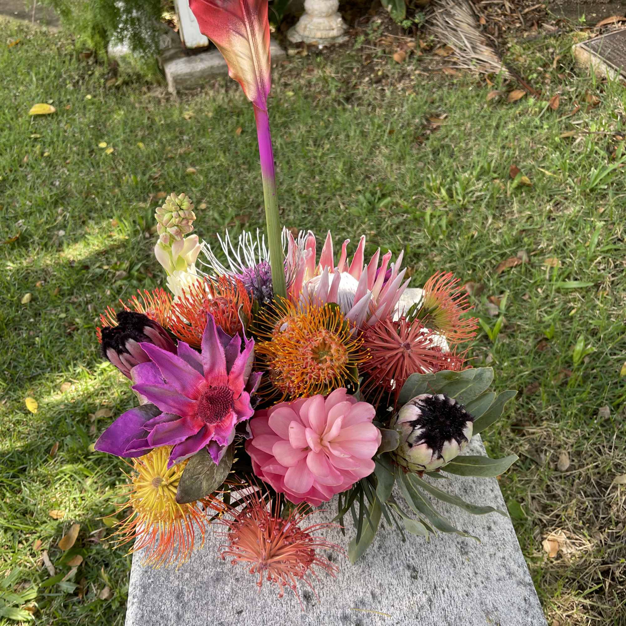 8 medium centerpiece style arrangements at $175 each
3 large sweetheart bouquets at