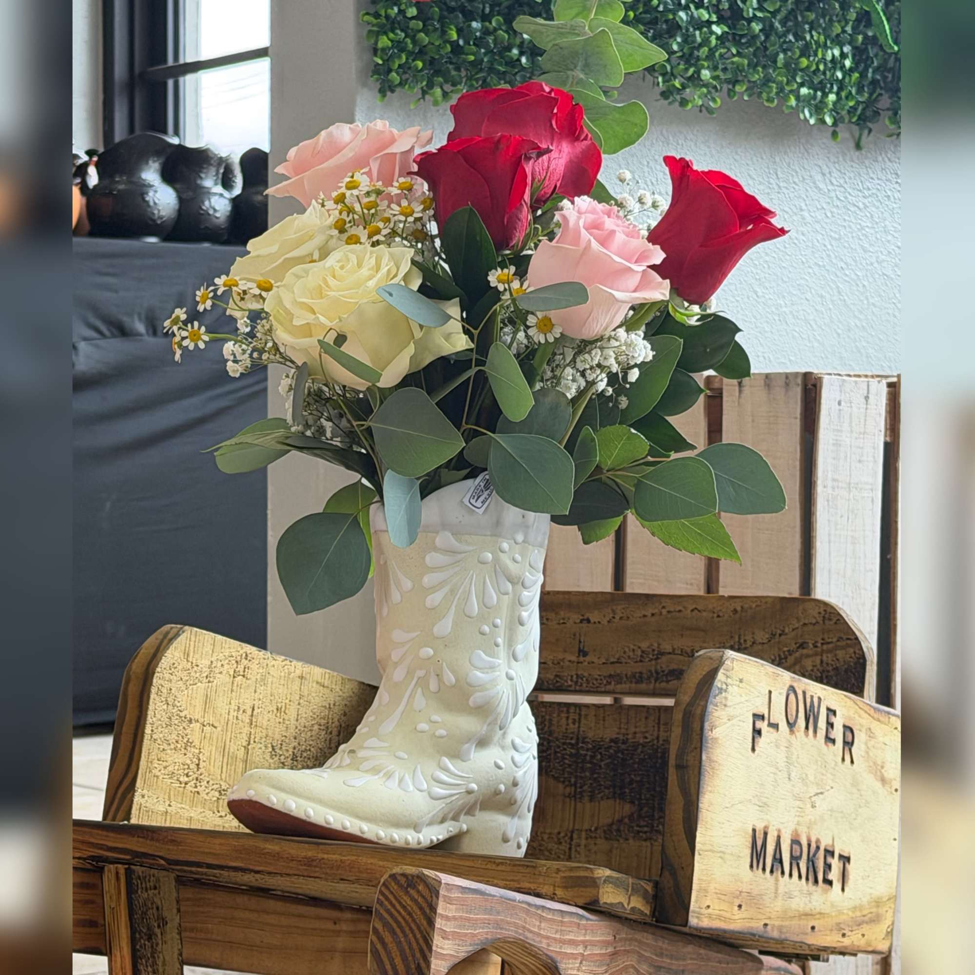 Red and rosy charm makes this Mother's Day bouquet feel like a