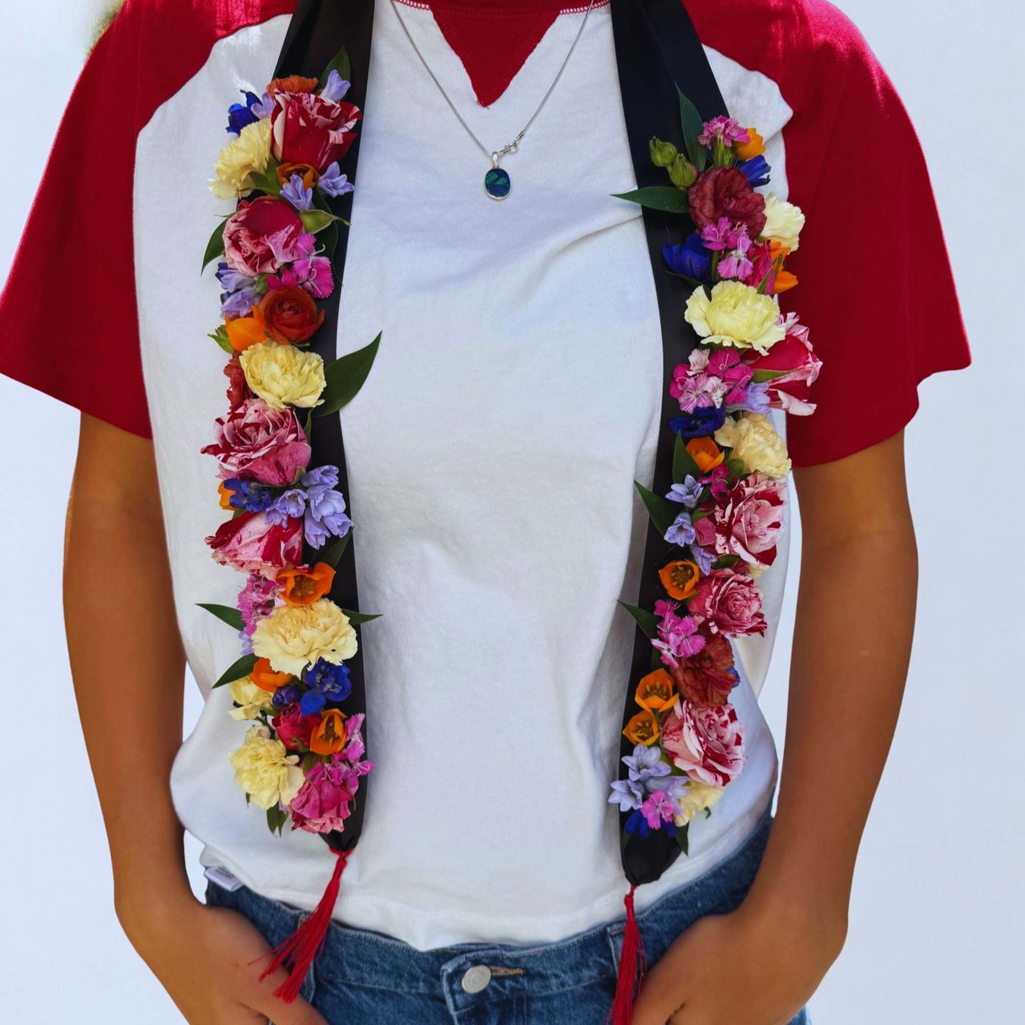 Celebrate graduation in style with our fresh floral graduation swag. Designed with
