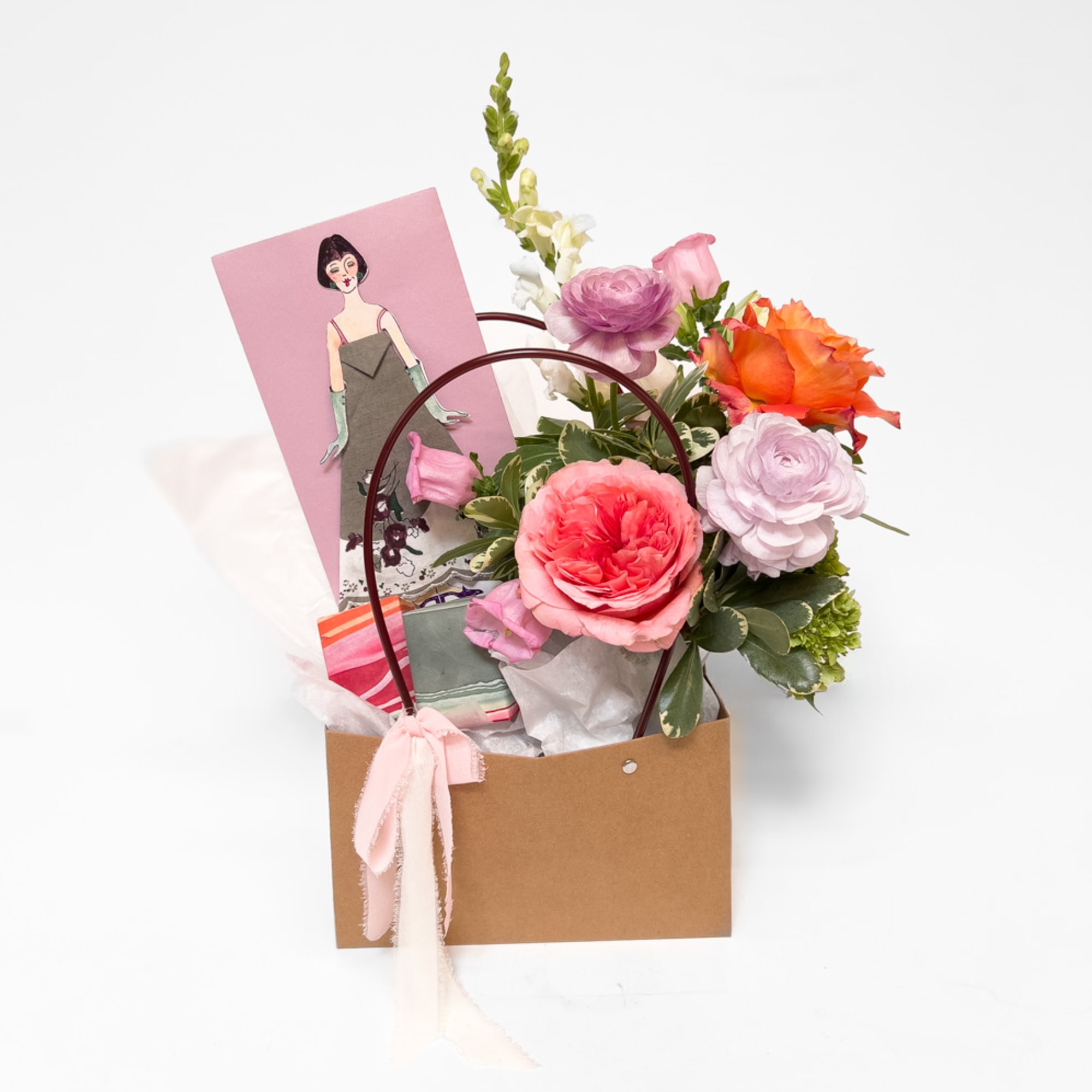 A soft, seasonal palette of summer blooms is paired with two surprise