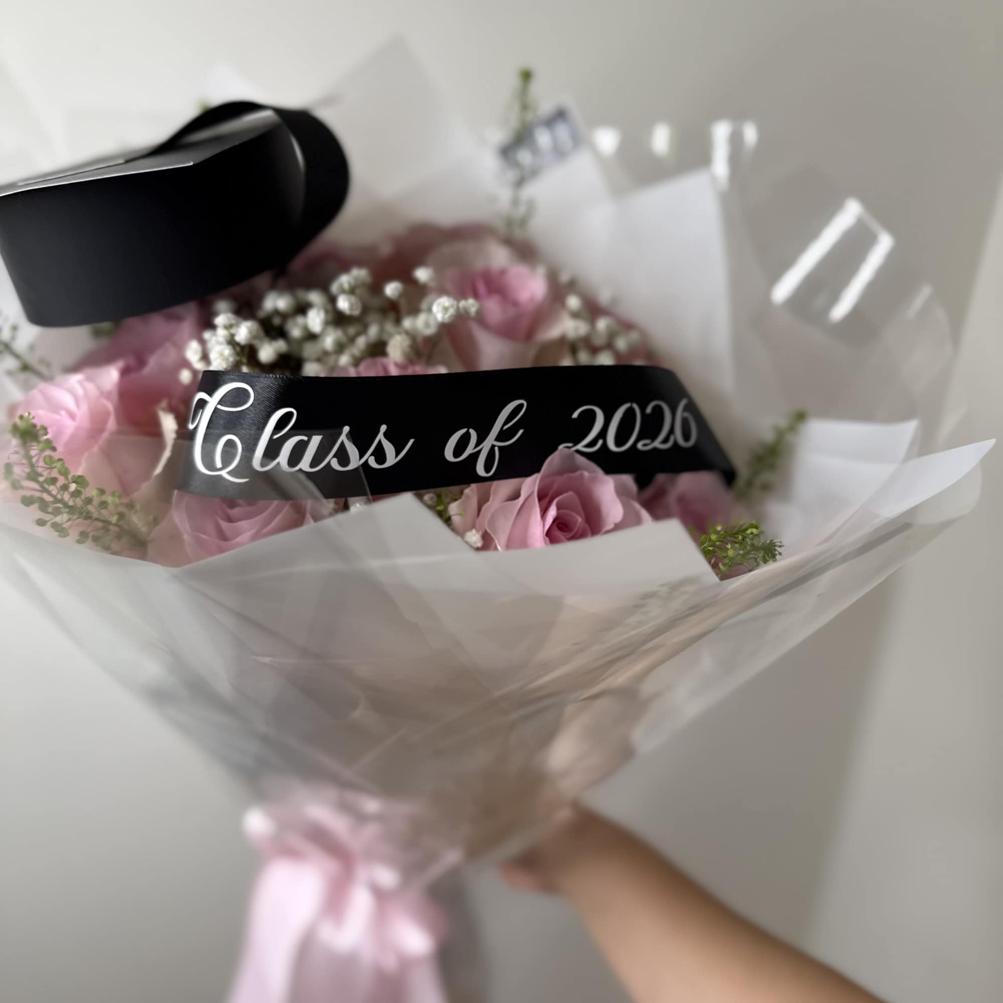 A full blush rose bouquet designed with soft pink roses, baby&rsquo;s breath