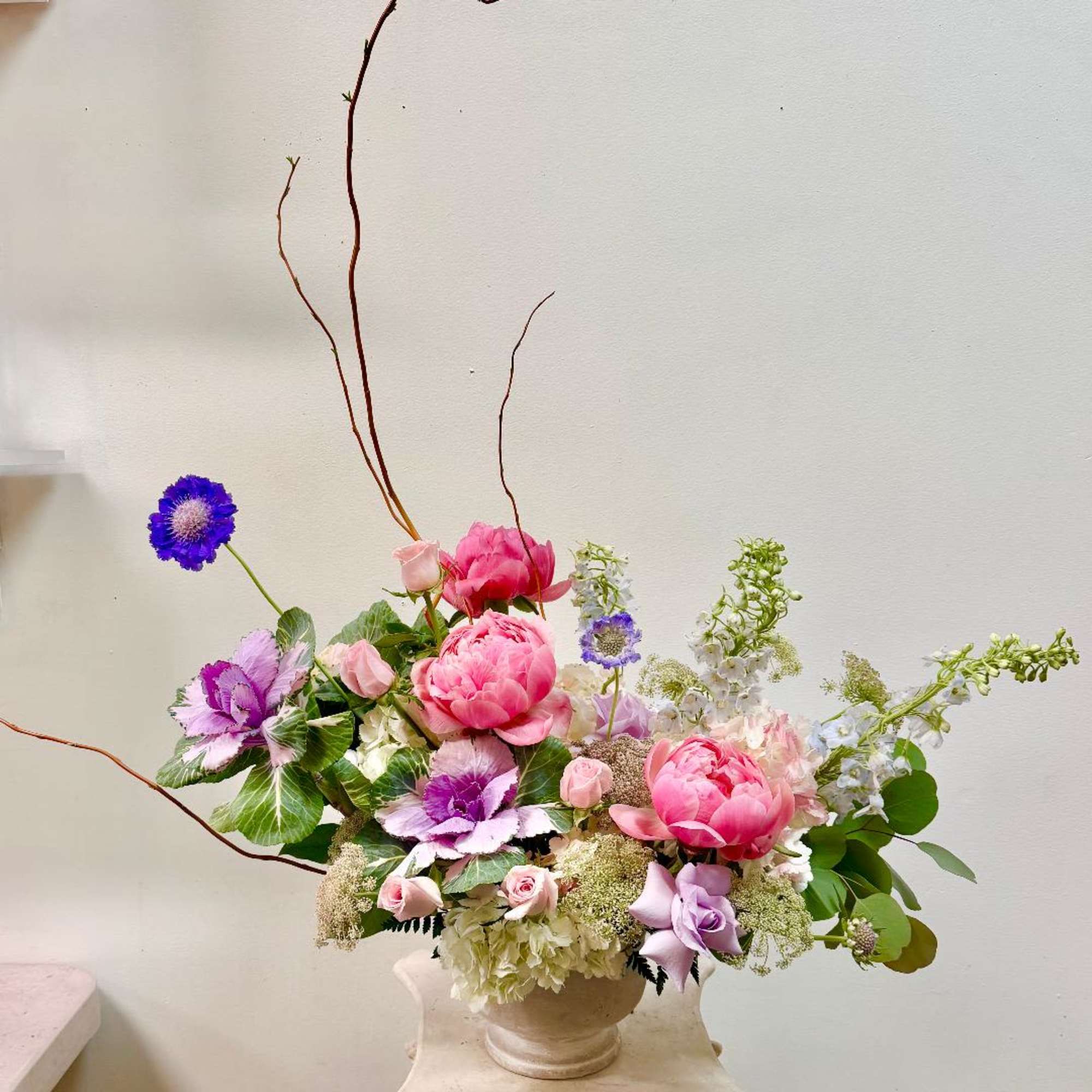 Product Information:

Arrangement Flowers: Peonies, Cabbage, Roses, Larkspur, Hydrangea, Delphinium,  &amp; greenery