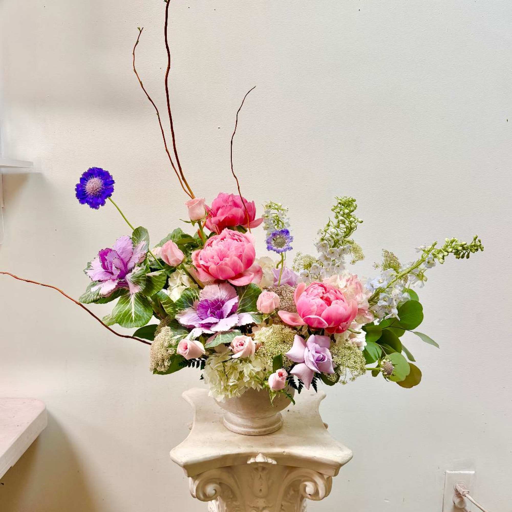 Product Information:

Arrangement Flowers: Peonies, Cabbage, Roses, Larkspur, Hydrangea, Delphinium,  &amp; greenery