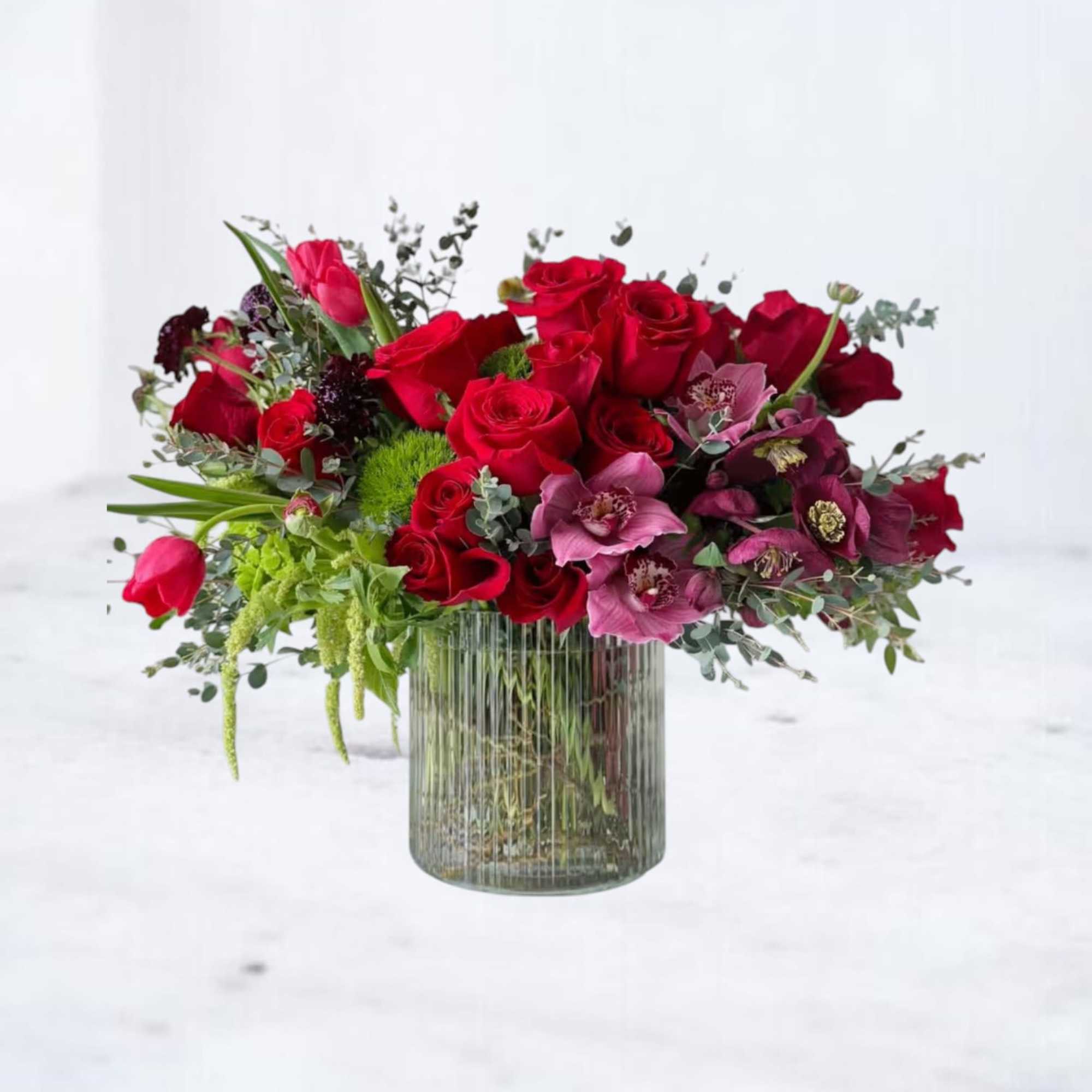 Rich, romantic, and designed with depth, After Hours features lush red roses