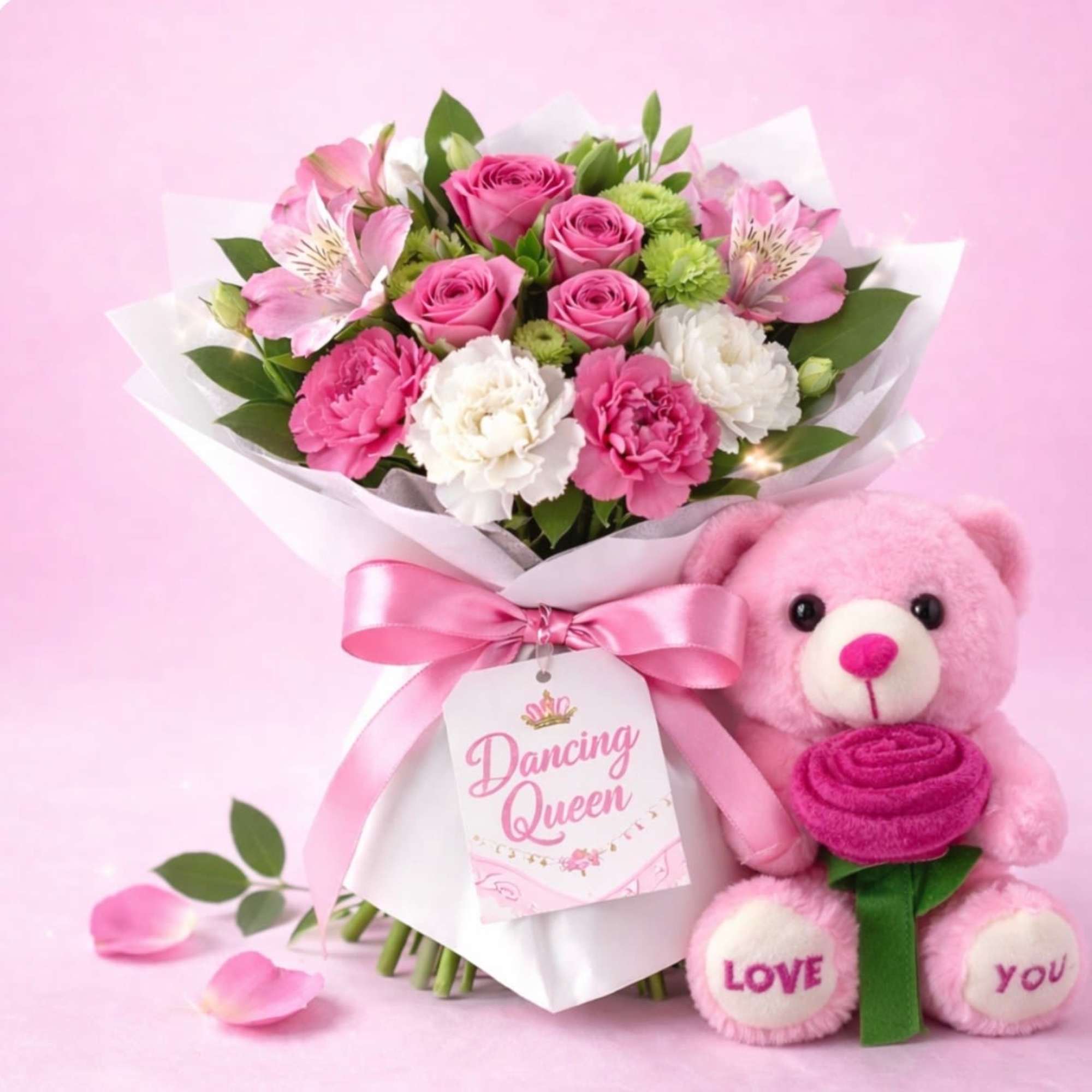 Pink and white bouquet with a teddy bear holding a rose