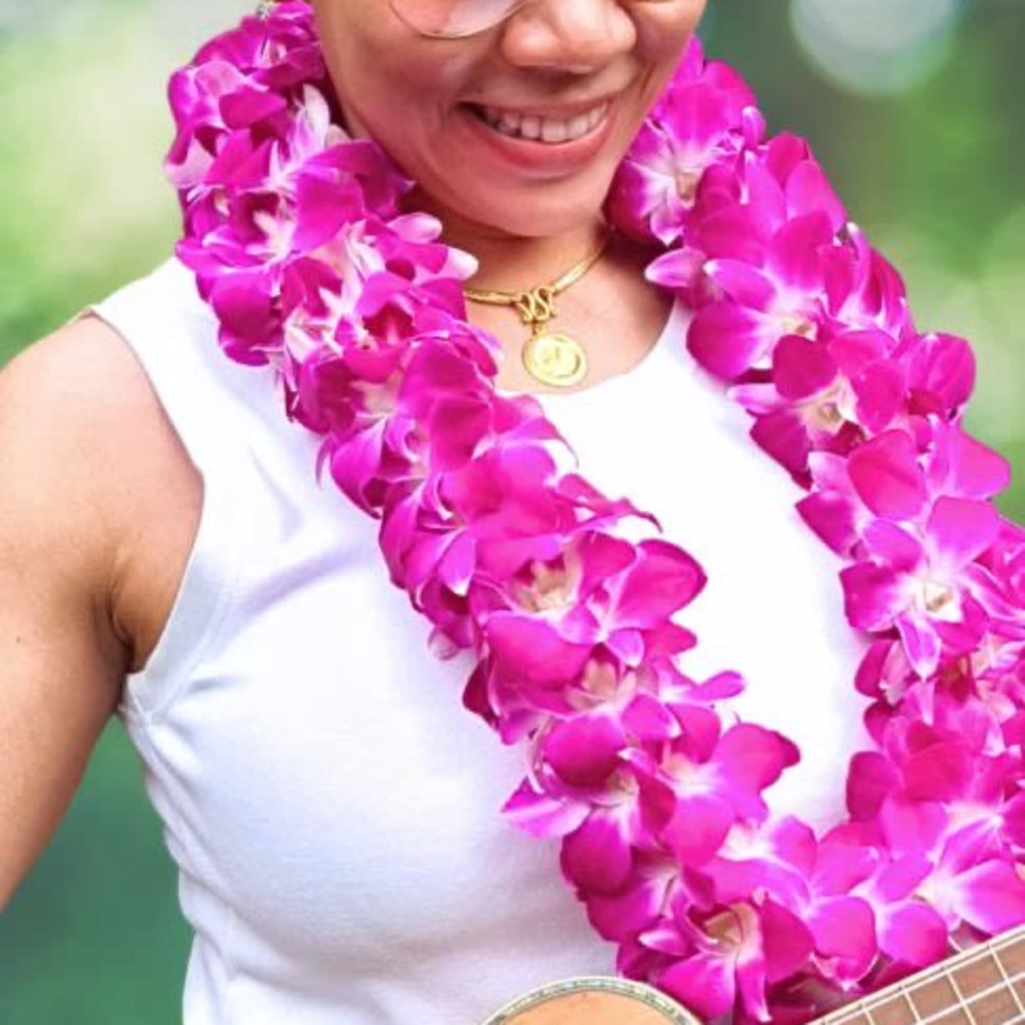 Beautiful double stranded orchid lei gives you over 100+ blooms for fullness
