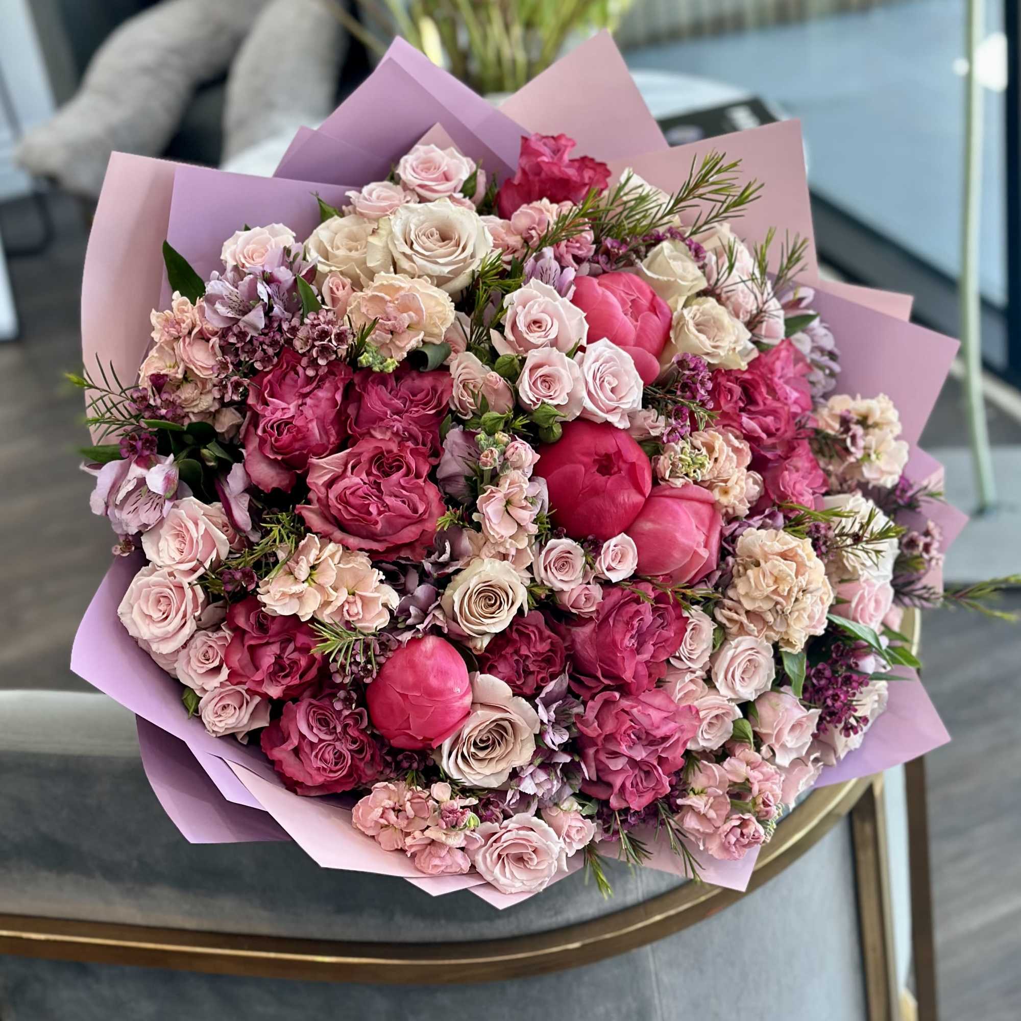 A stunning and colorful arrangement of fine flowers is ideal for any
