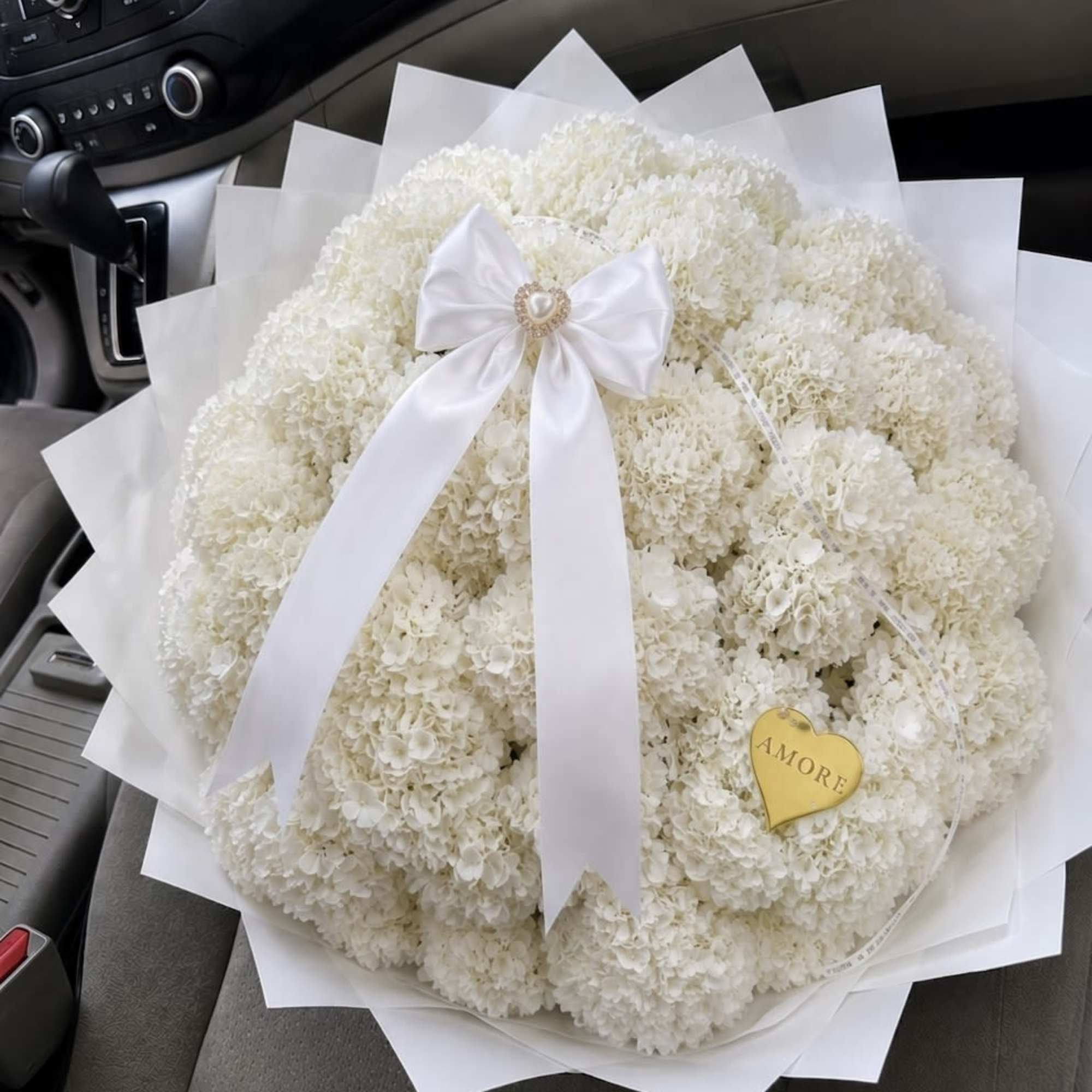 Our Hydrangea Luxury Bouquet is a timeless arrangement designed to bring elegance