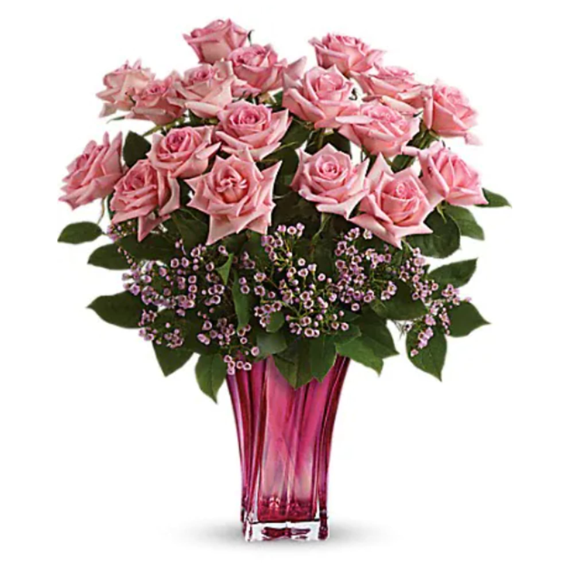 Pink roses arranged in a tall pink glass vase