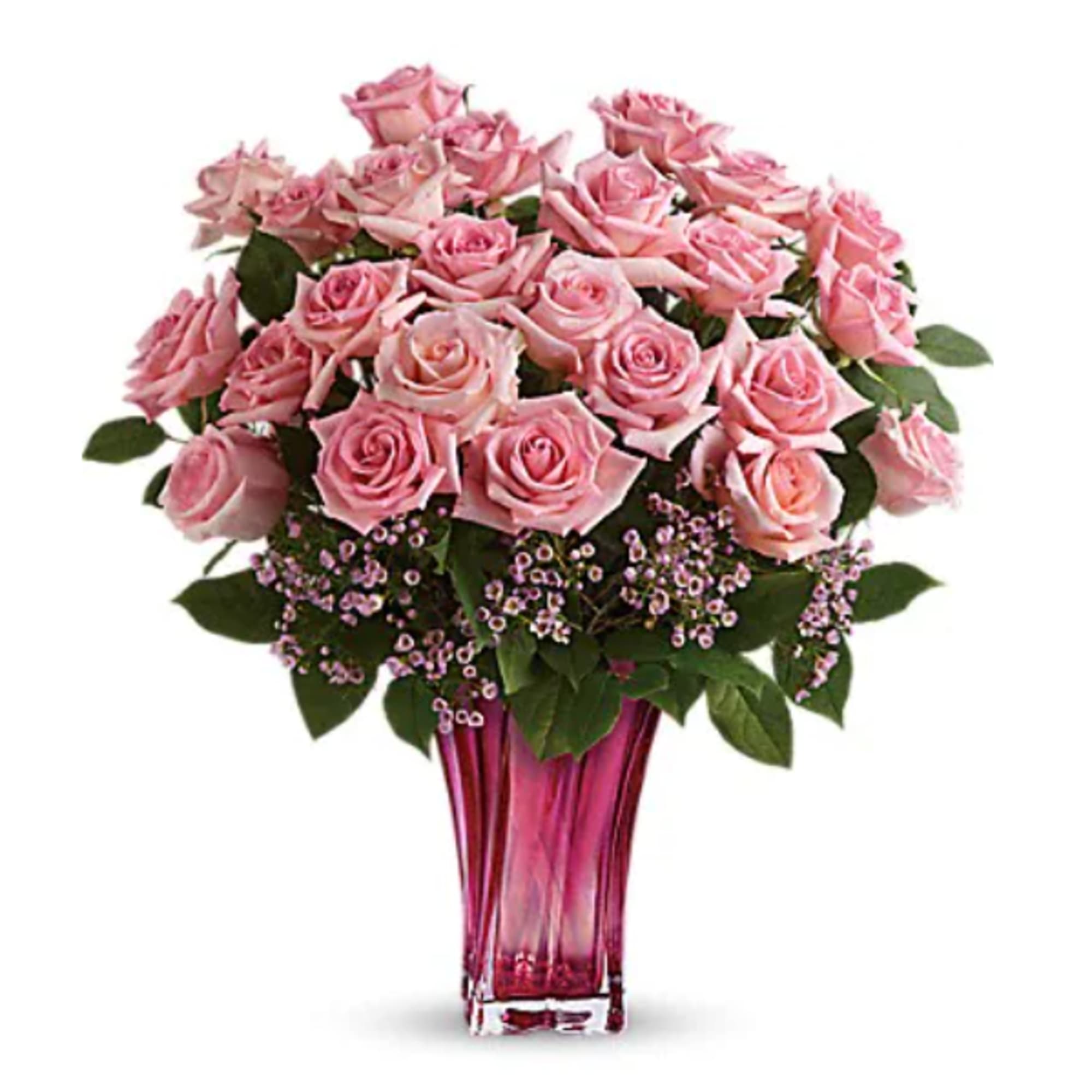 Pink roses arranged in a tall pink glass vase