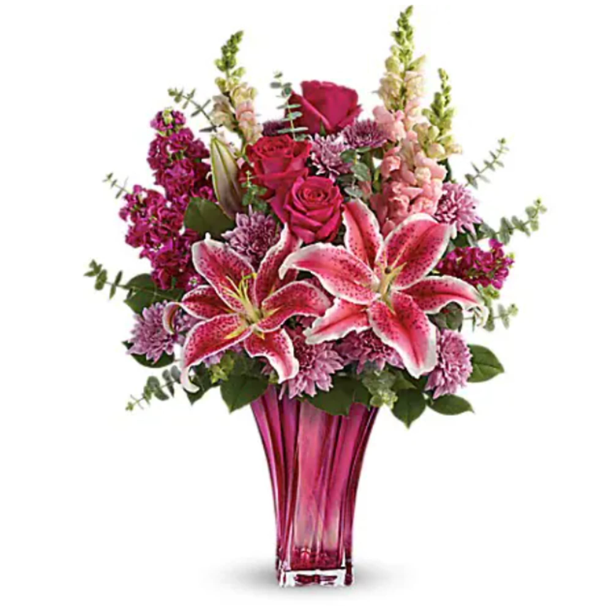 Pink lilies and roses in a tall magenta vase