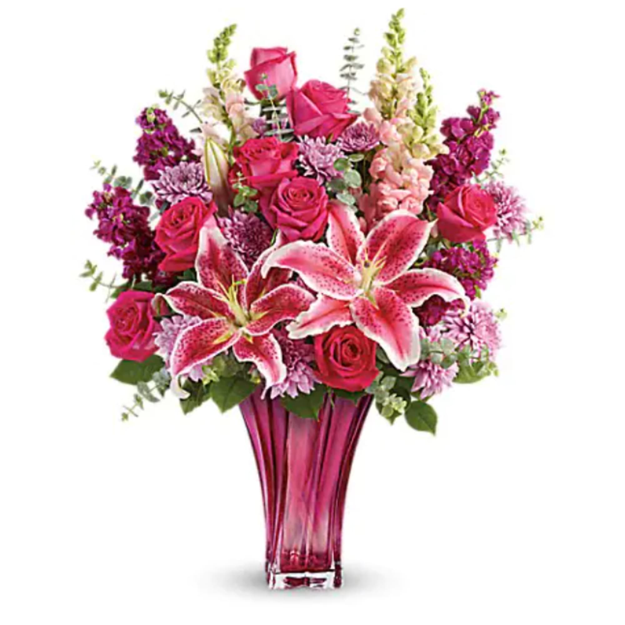 Pink roses and lilies in a tall magenta vase