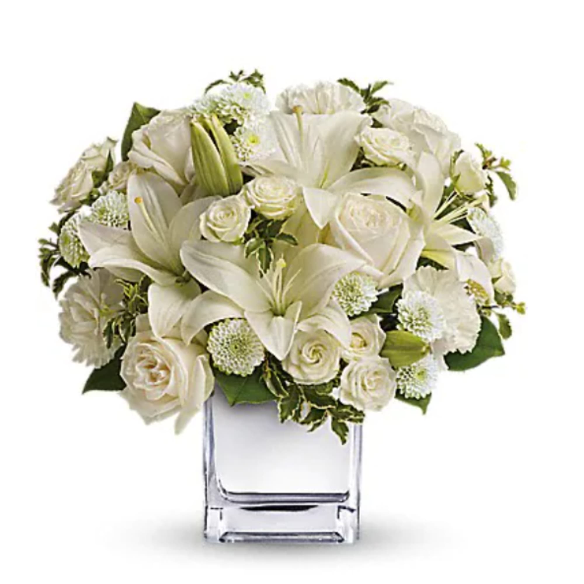 White floral bouquet in a clear glass vase
