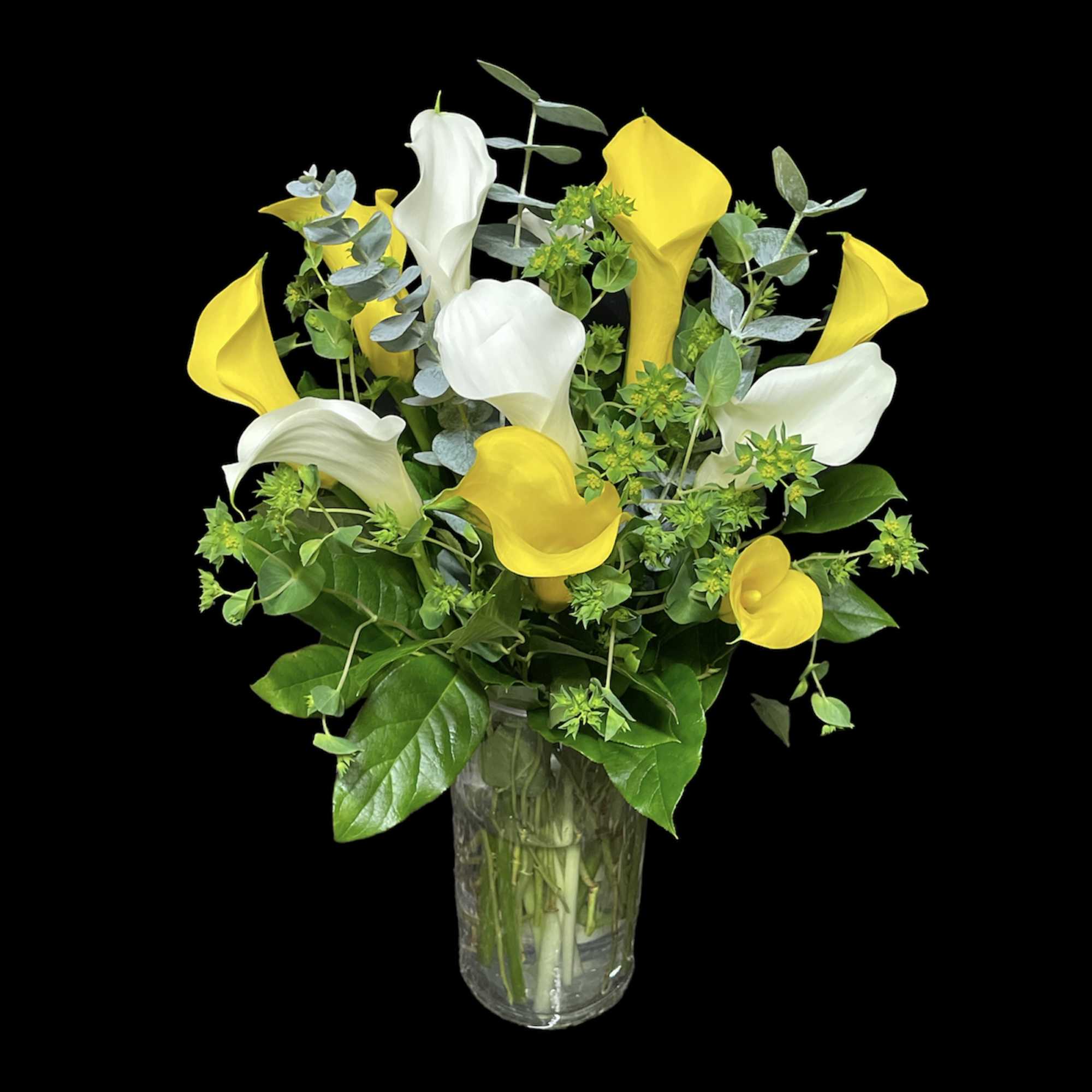 A beautiful arrangement with mixed or calla lilies 