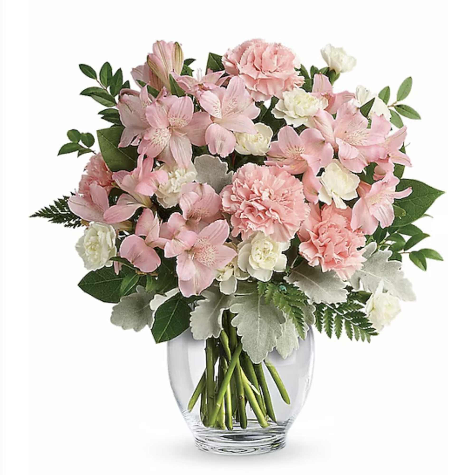 Pink and white flower arrangement with carnations and alstroemeria in a clear glass vase