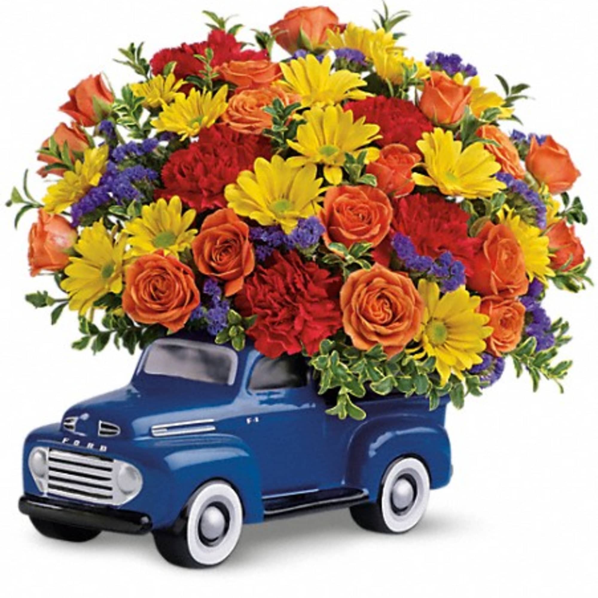 Bouquet of mixed flowers arranged in a blue truck container