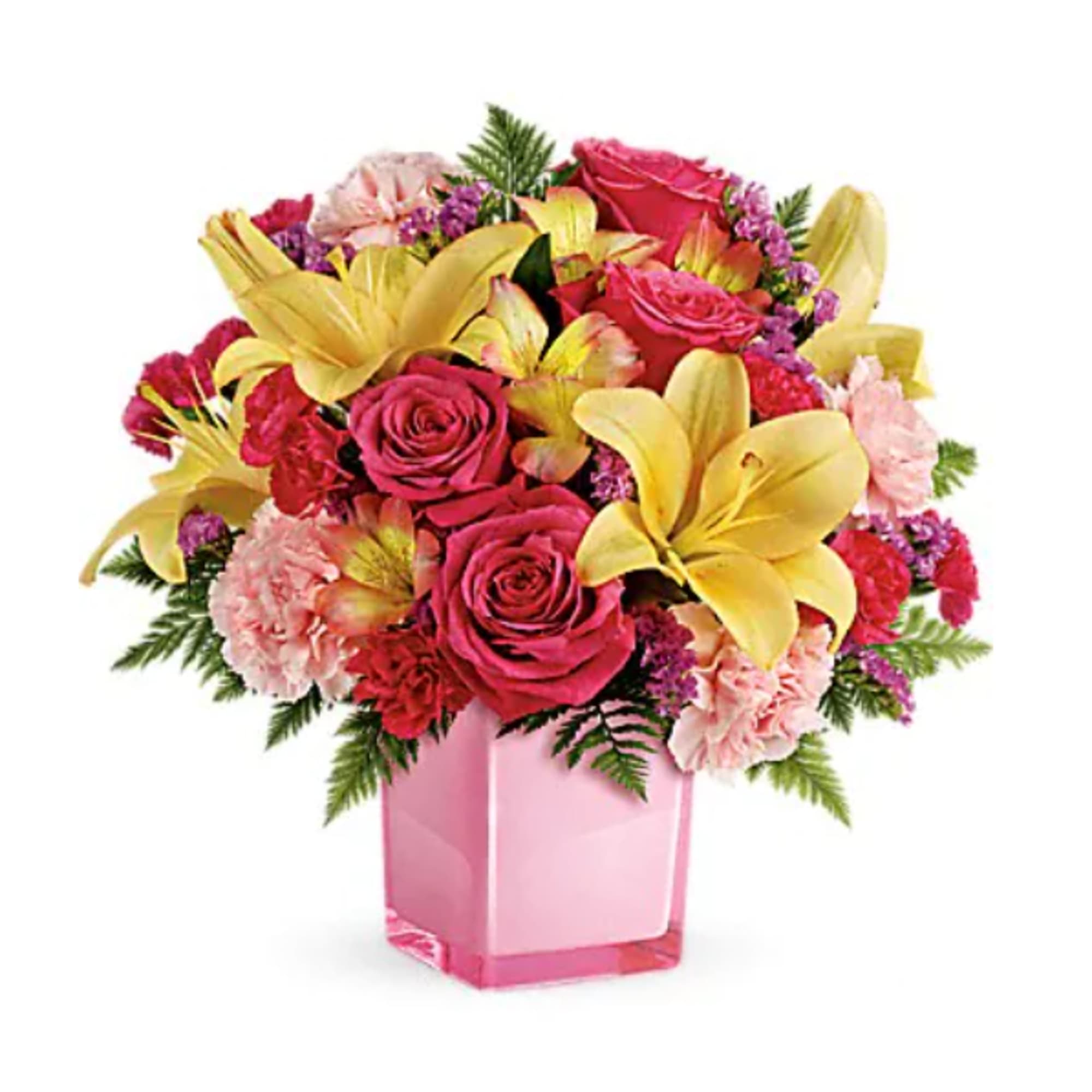 Pink and yellow floral arrangement in a pink glass vase