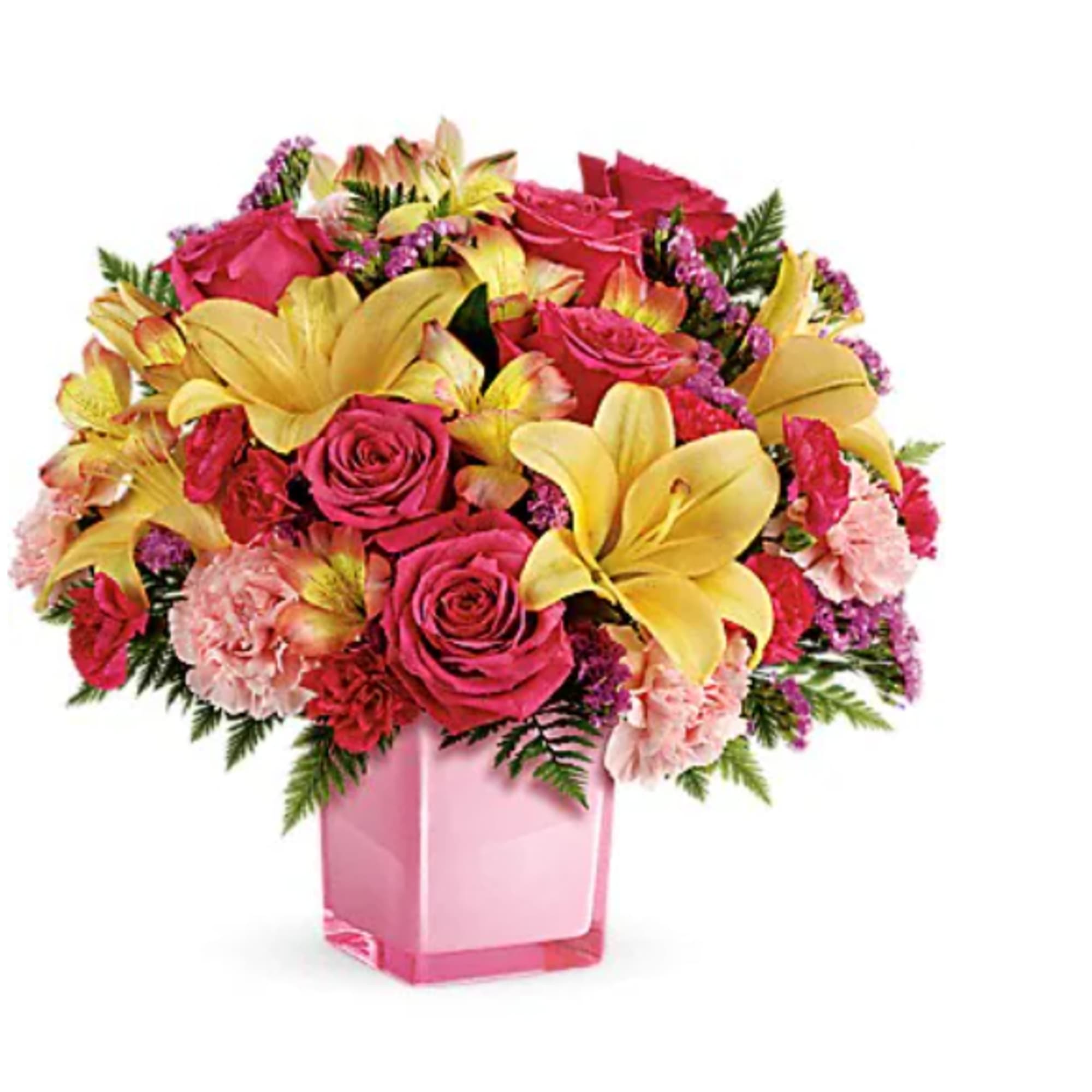 Pink and yellow mixed flower arrangement in a pink vase