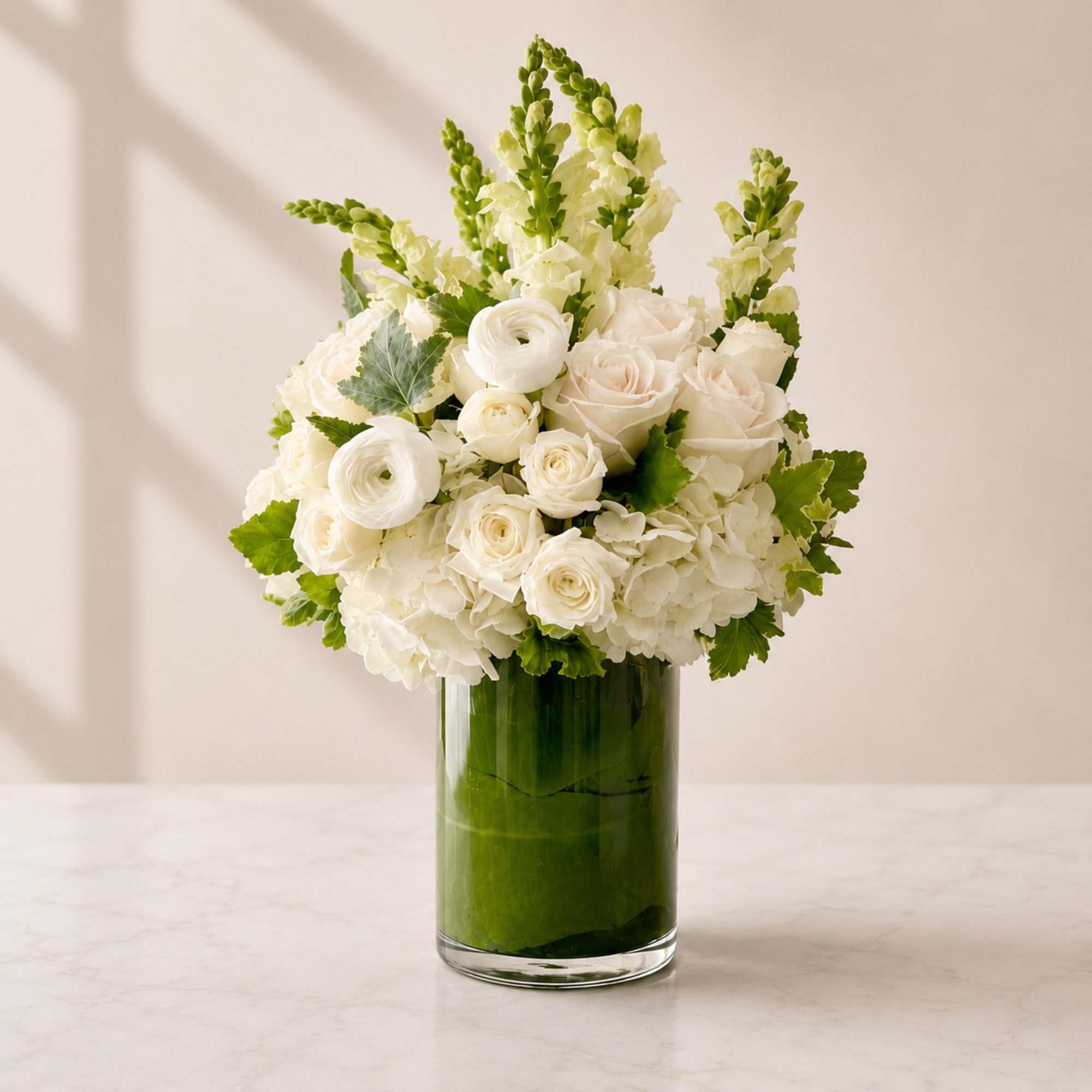 Elevate any space with our Angelique Arrangement, a timeless blend of elegant