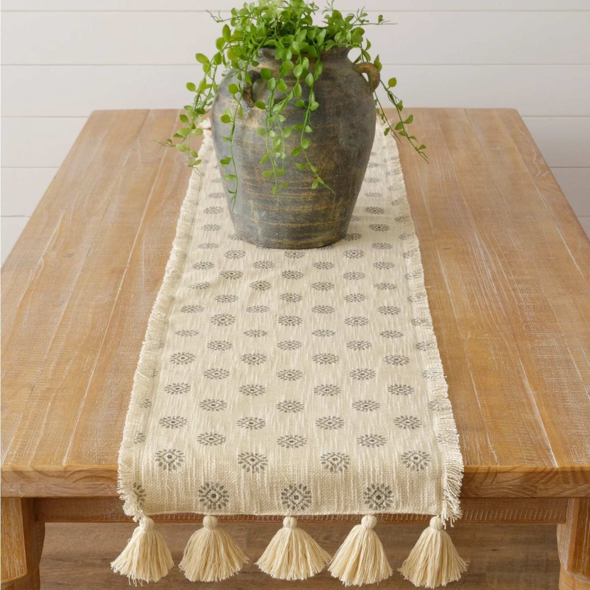 56" x 13" table runner with a medallion pattern
