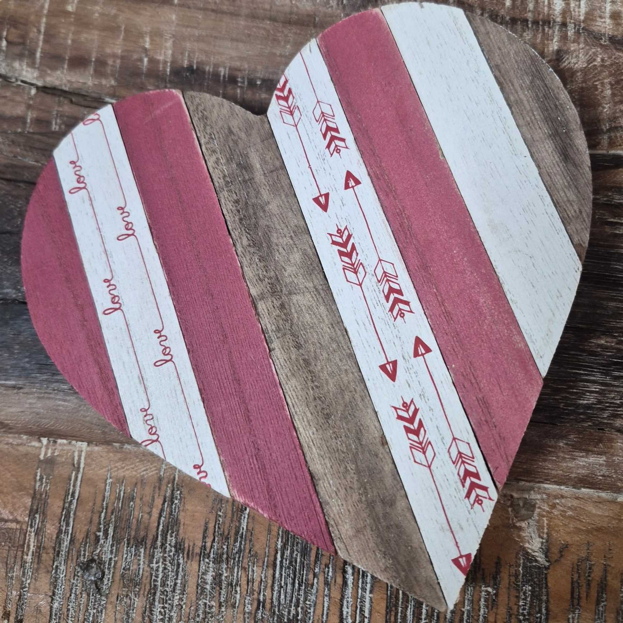 This adorable wooden heart brings a fun touch to home decor.
Dimensions: 