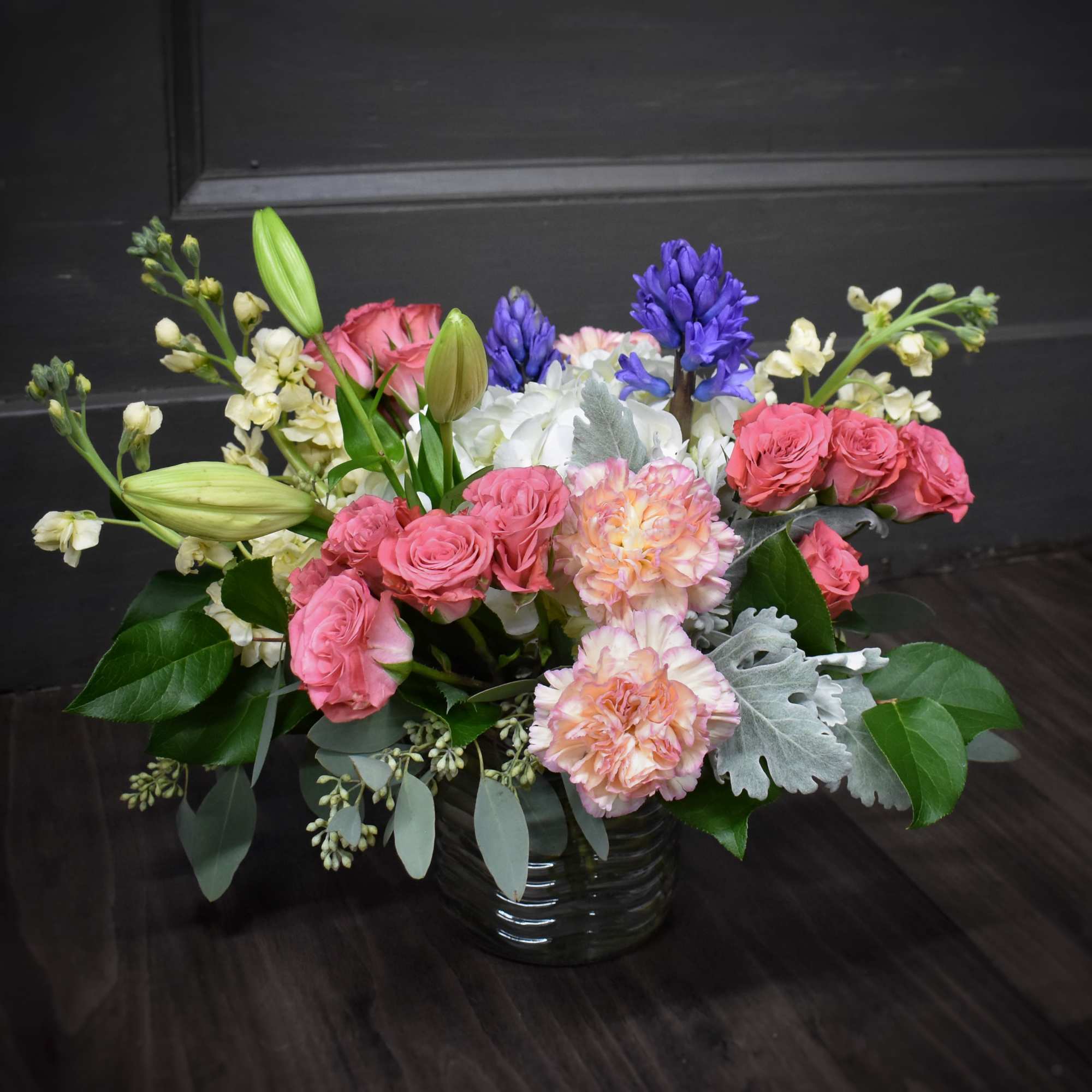 Just like a piece of art, this vase of soft colored spring