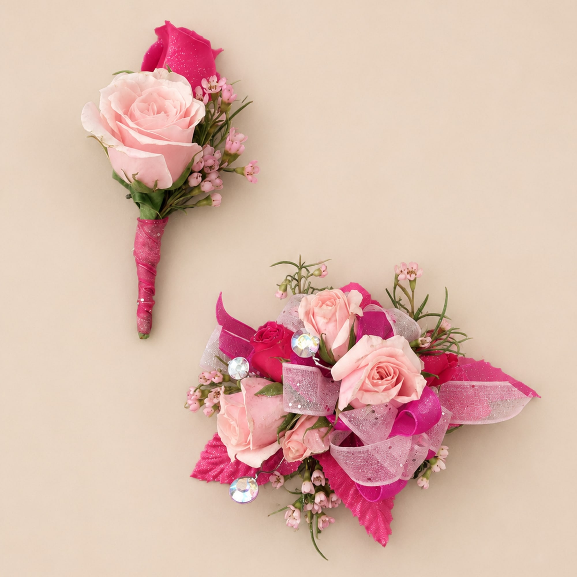 Soft blush and bright pink roses mingle with delicate white and purple