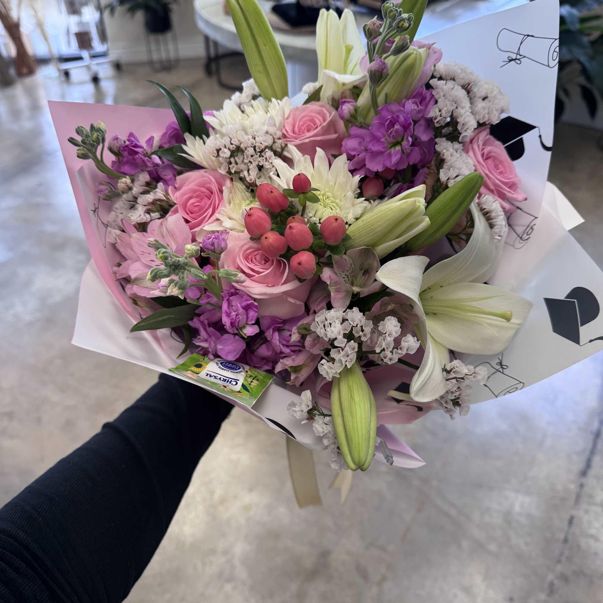 Wrapped bouquets for graduation. These arrangements will be made with a mix