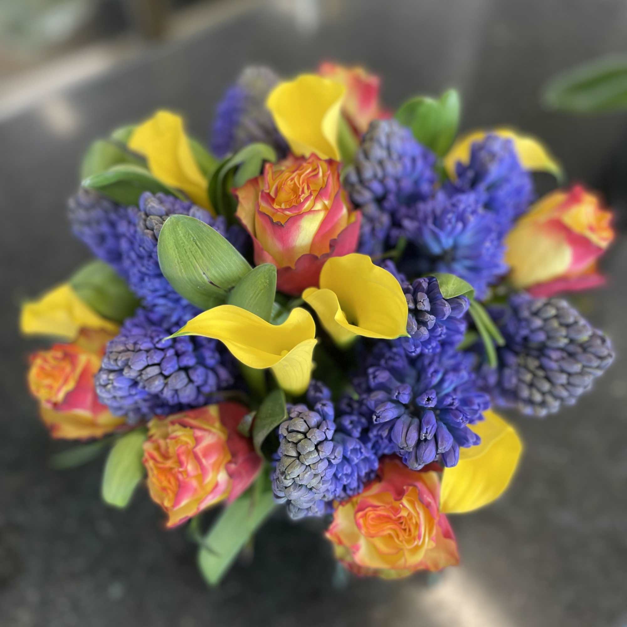 Medium / Large table arrangement of Blue Hyacinth and Mixture of Yellow