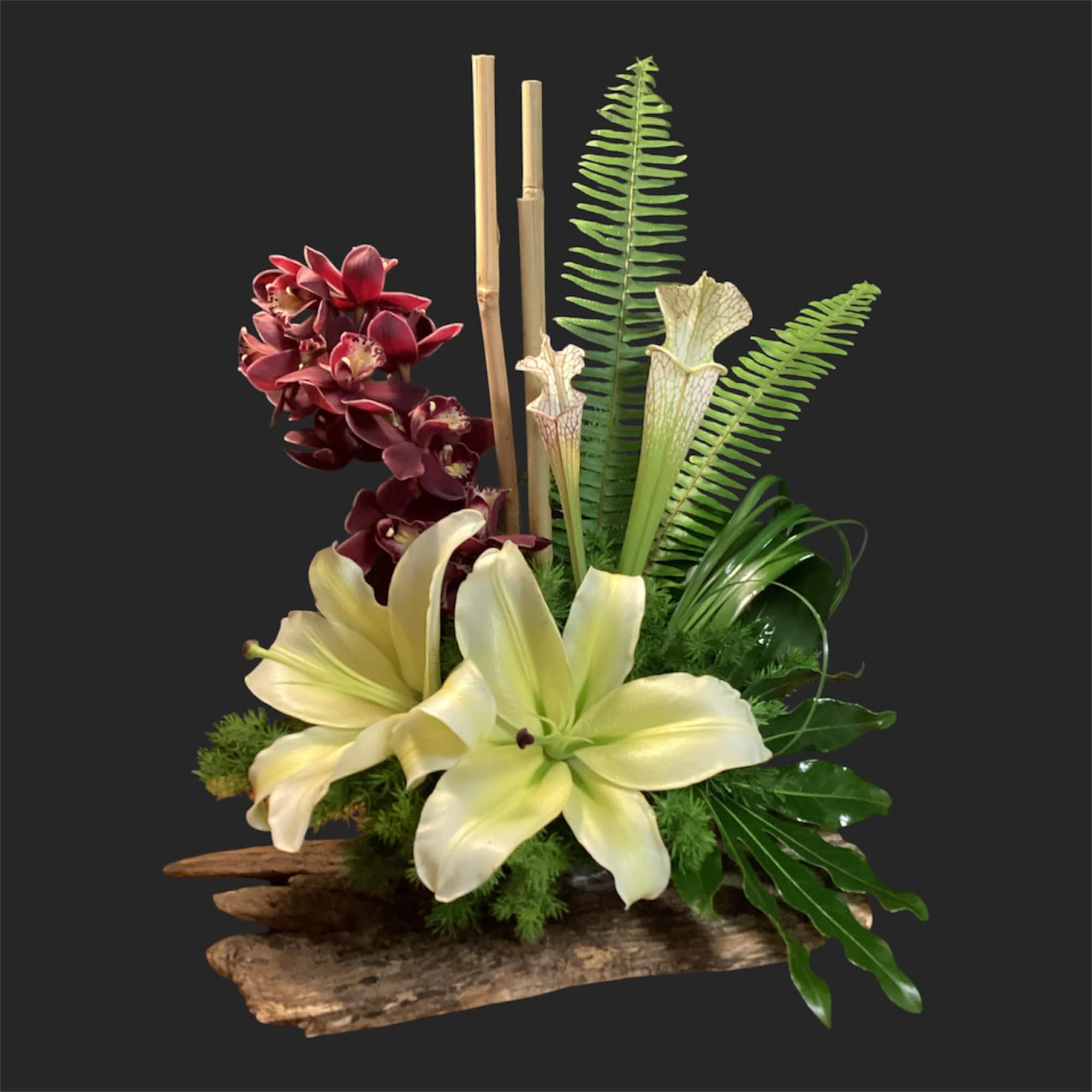 A lively, ever-changing bouquet that surprises with garden-fresh personality-this designer's choice exquisite