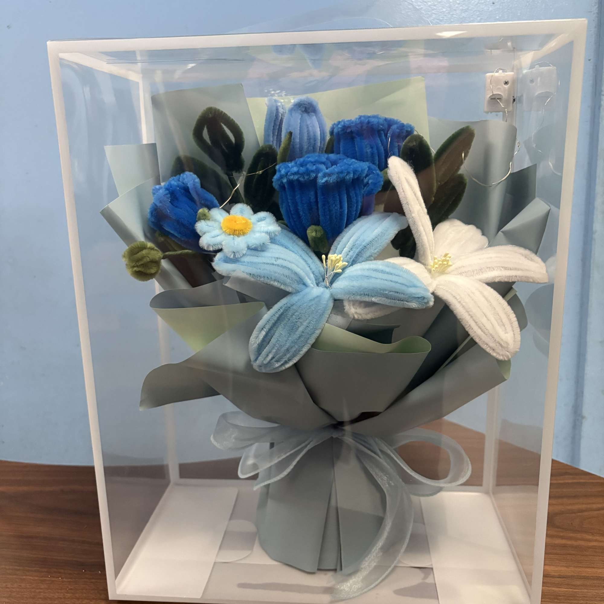 Soft, playful chenille blooms make this blue bouquet an ideal everyday gift