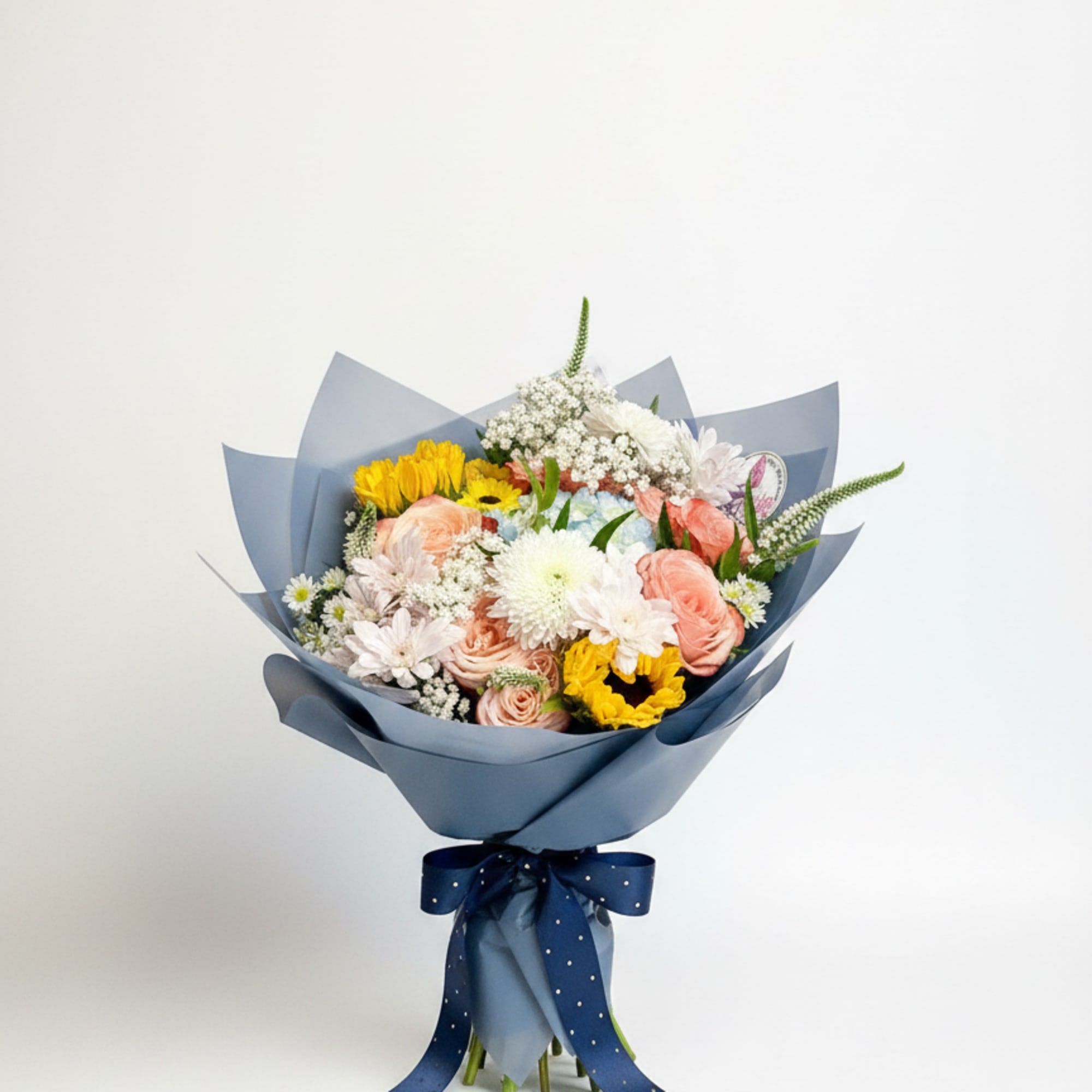 Hand-Tied Designer&rsquo;s Choice Bouquet
Our Hand-Tied Designer&rsquo;s Choice Bouquet features a seasonal mix