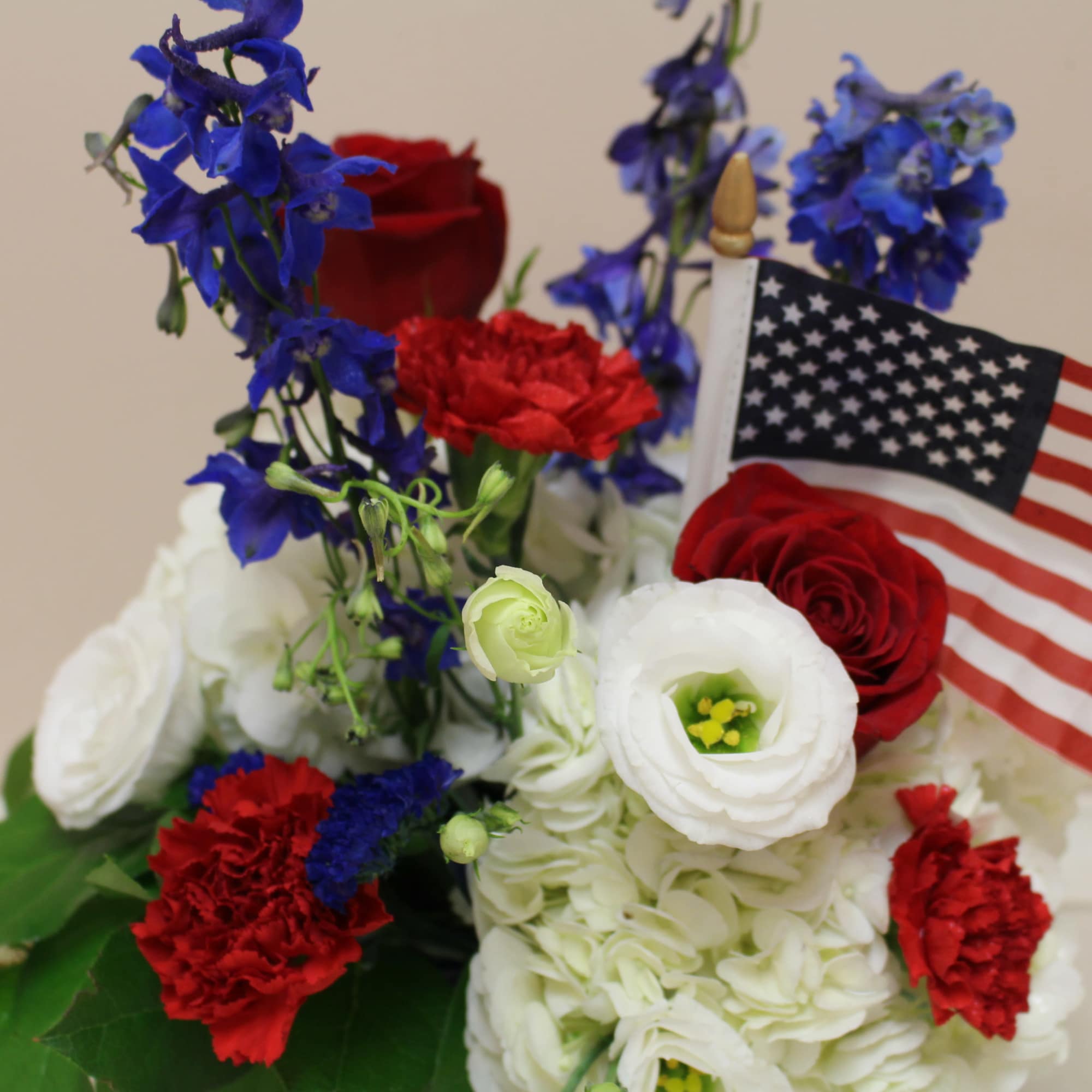 Red white and blue.  Say "Happy 4th" with flowers 