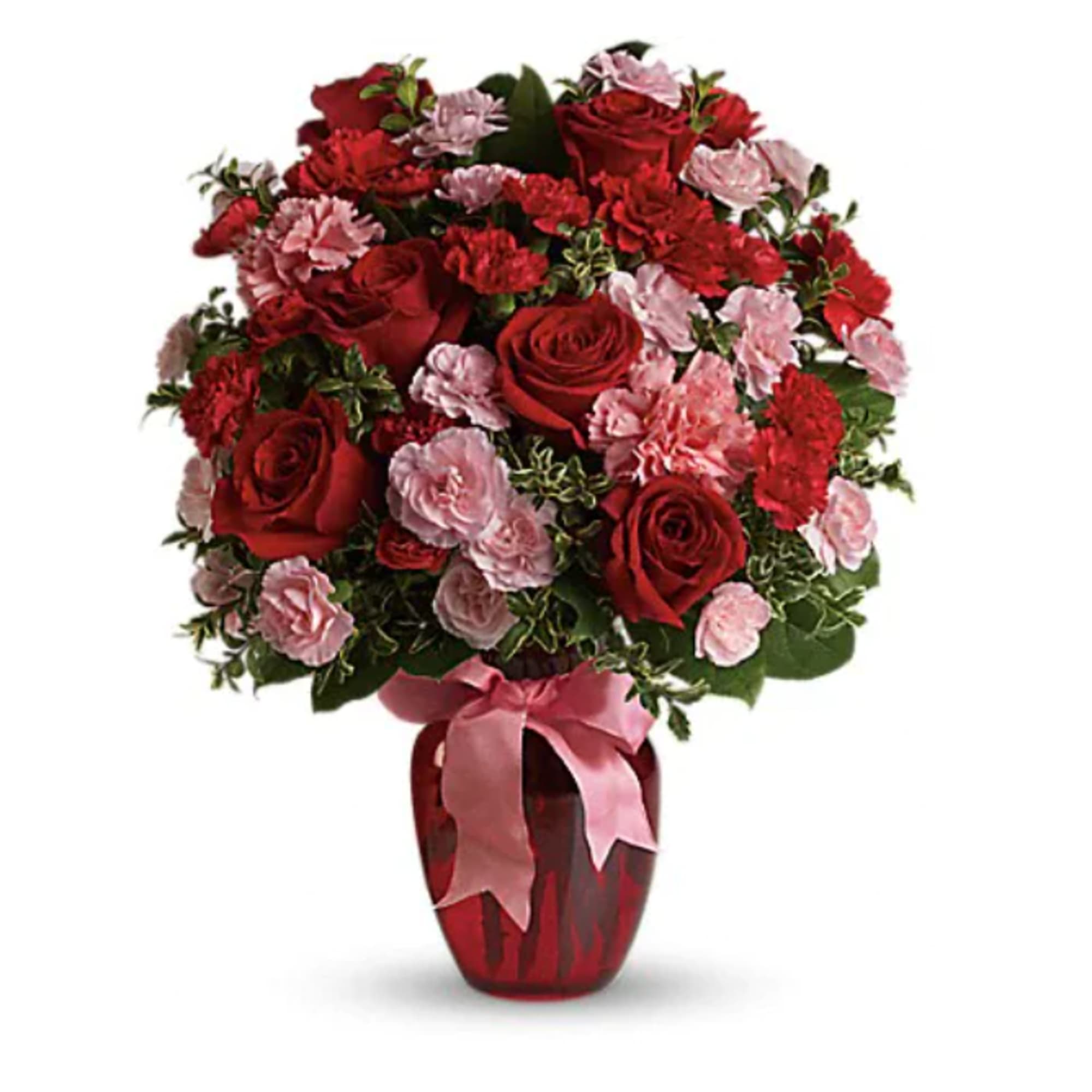Red roses and pink carnations in a red vase with a pink ribbon