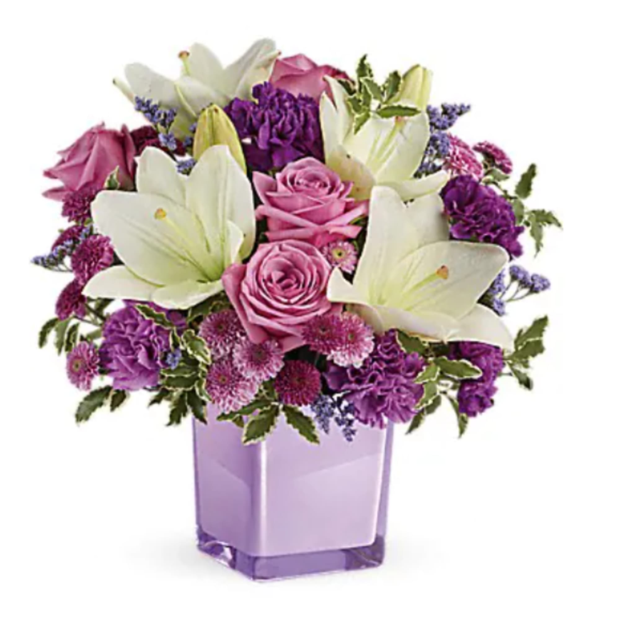 Pink roses and white lilies in a lavender vase