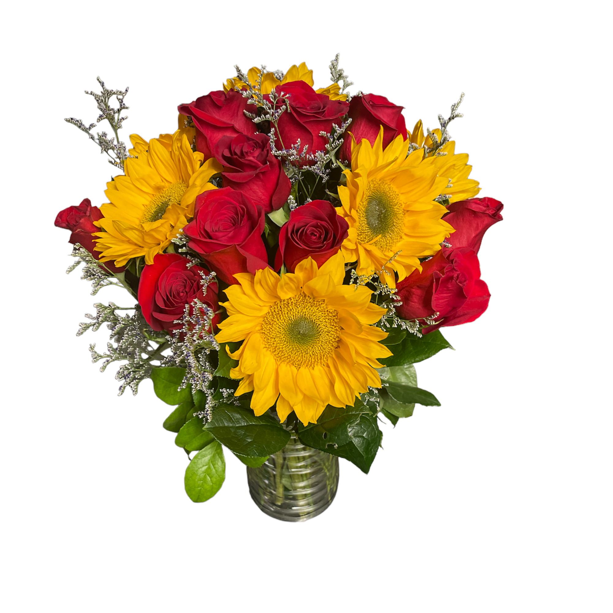 Bouquet of red roses and yellow sunflowers in a glass vase