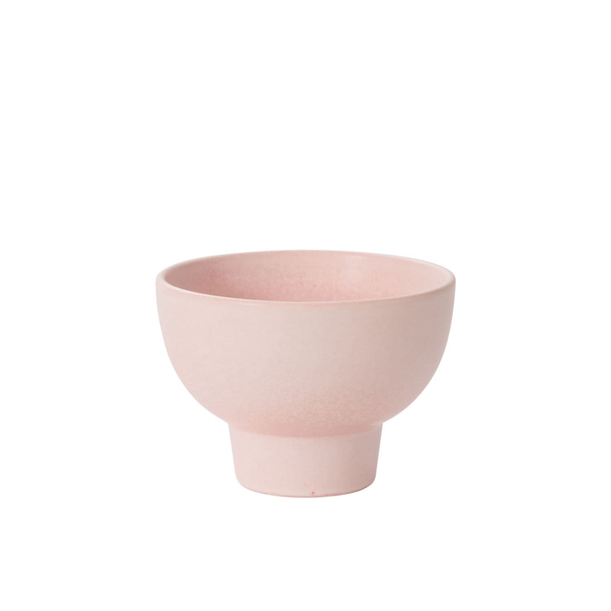 A pale pink ceramic bowl-shaped vase on a white background