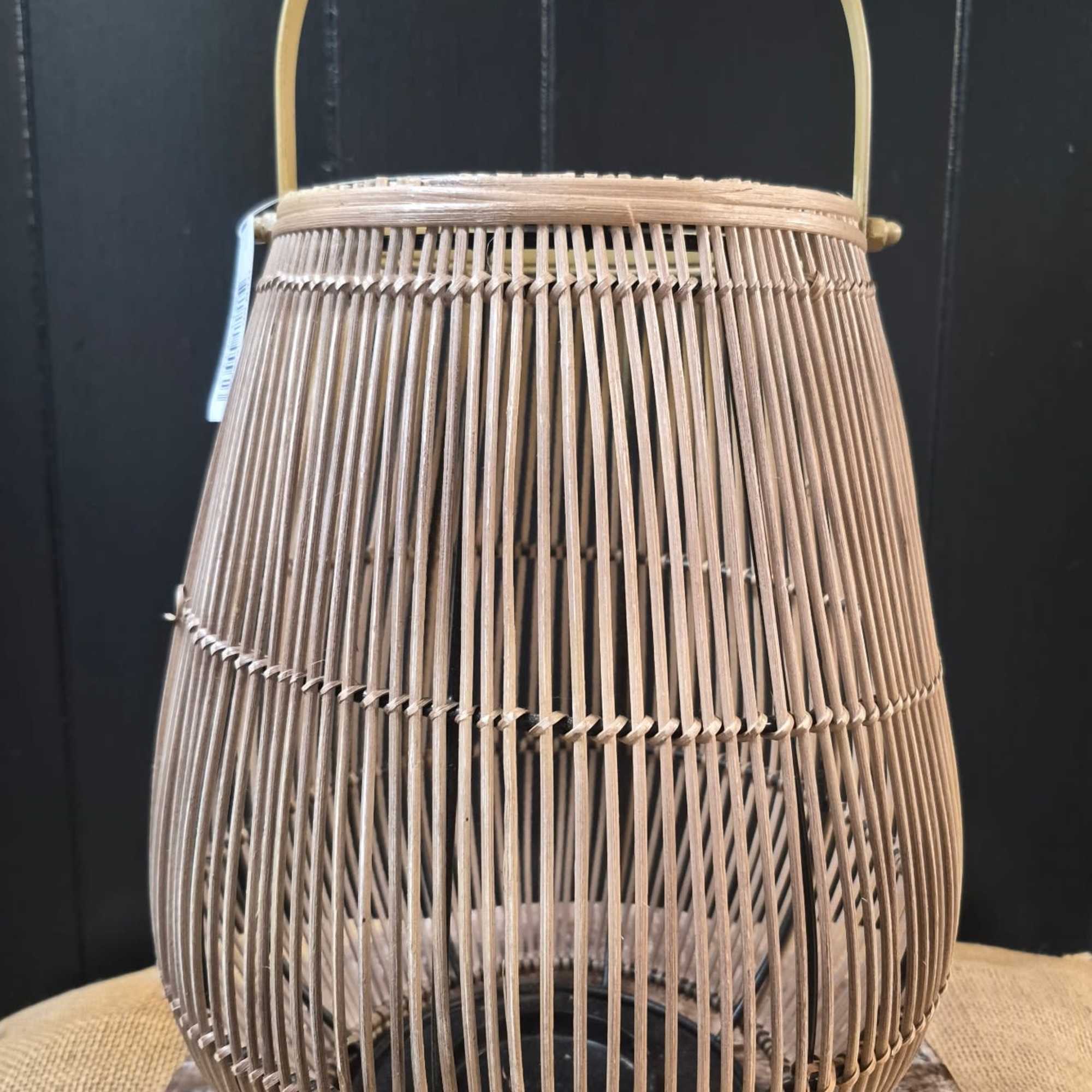 This beautiful rattan 13" lantern is a gift-ready centerpiece
Dimensions:  10" x