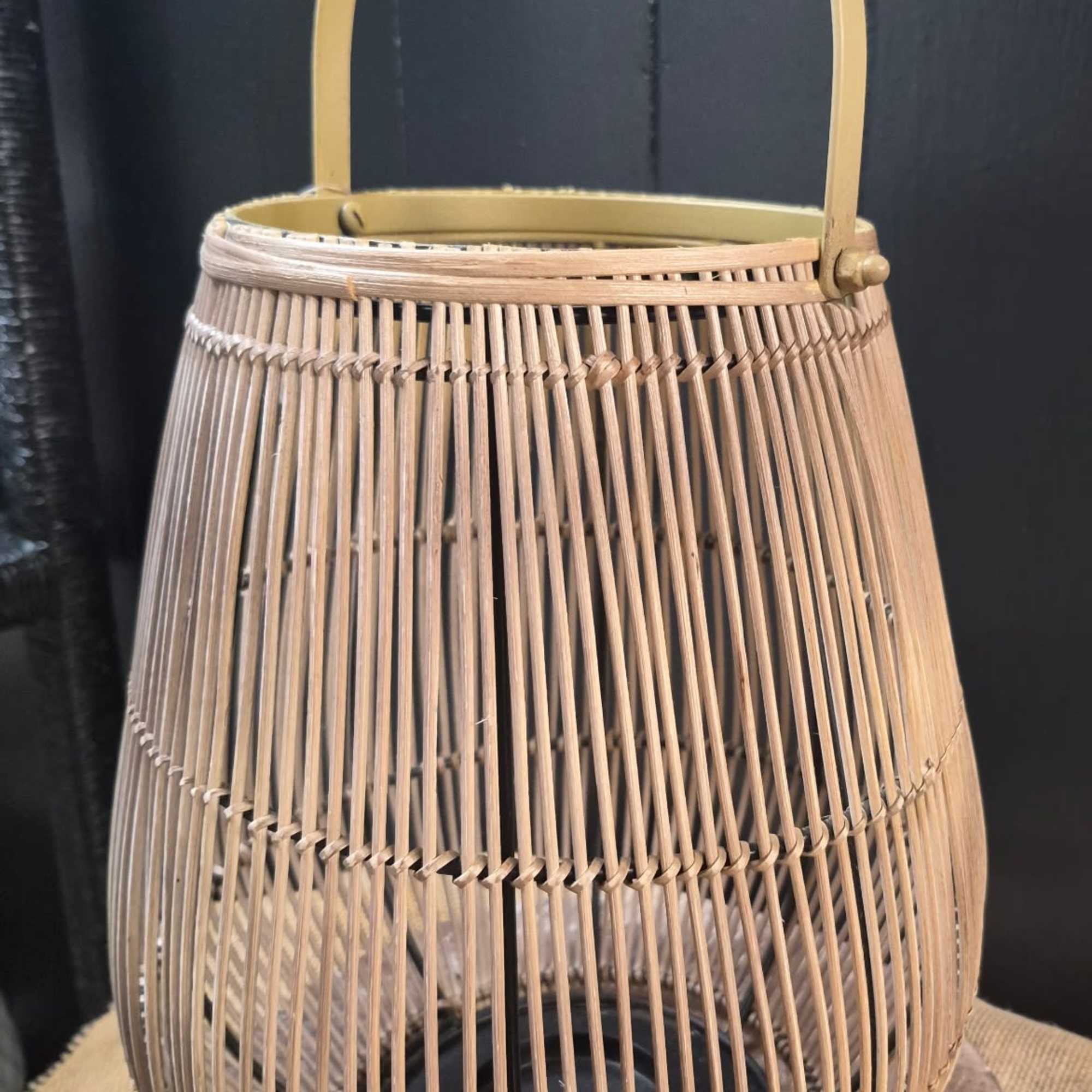 This beautiful rattan 13" lantern is a gift-ready centerpiece
Dimensions:  10" x