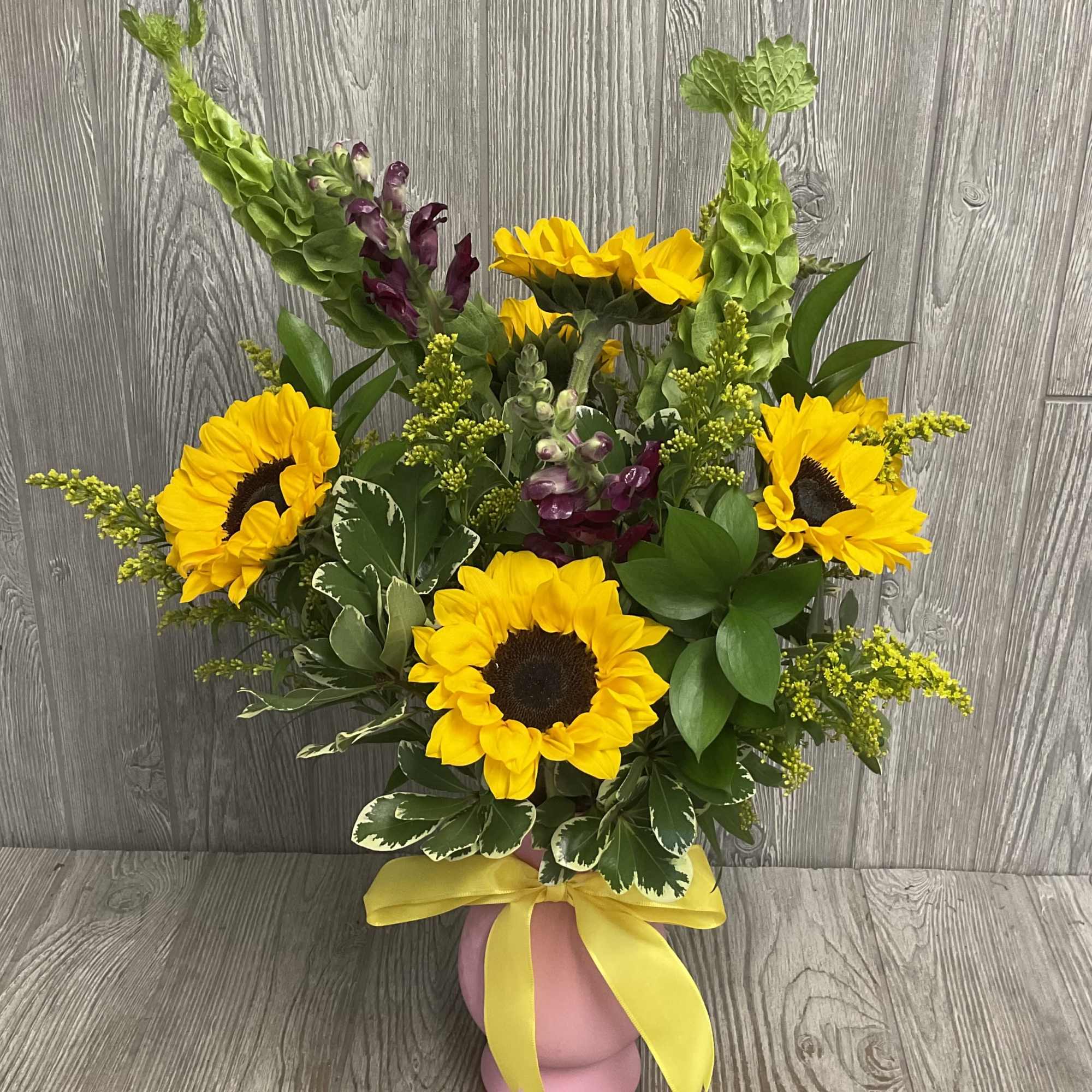 This arrangement is pet friendly! Flowers may vary but will stay pet