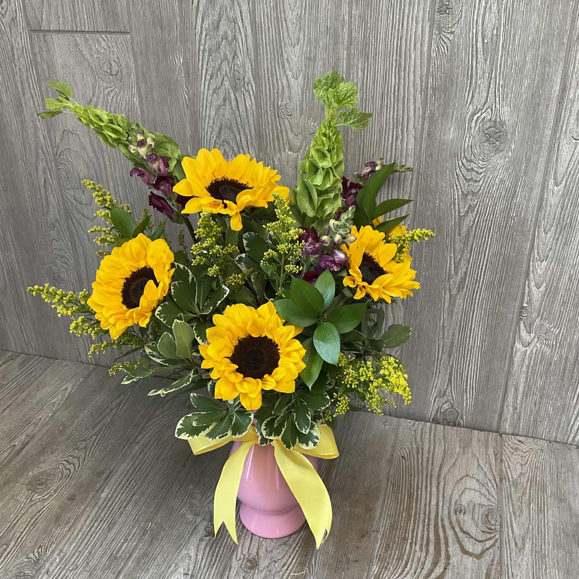 This arrangement is pet friendly! Flowers may vary but will stay pet