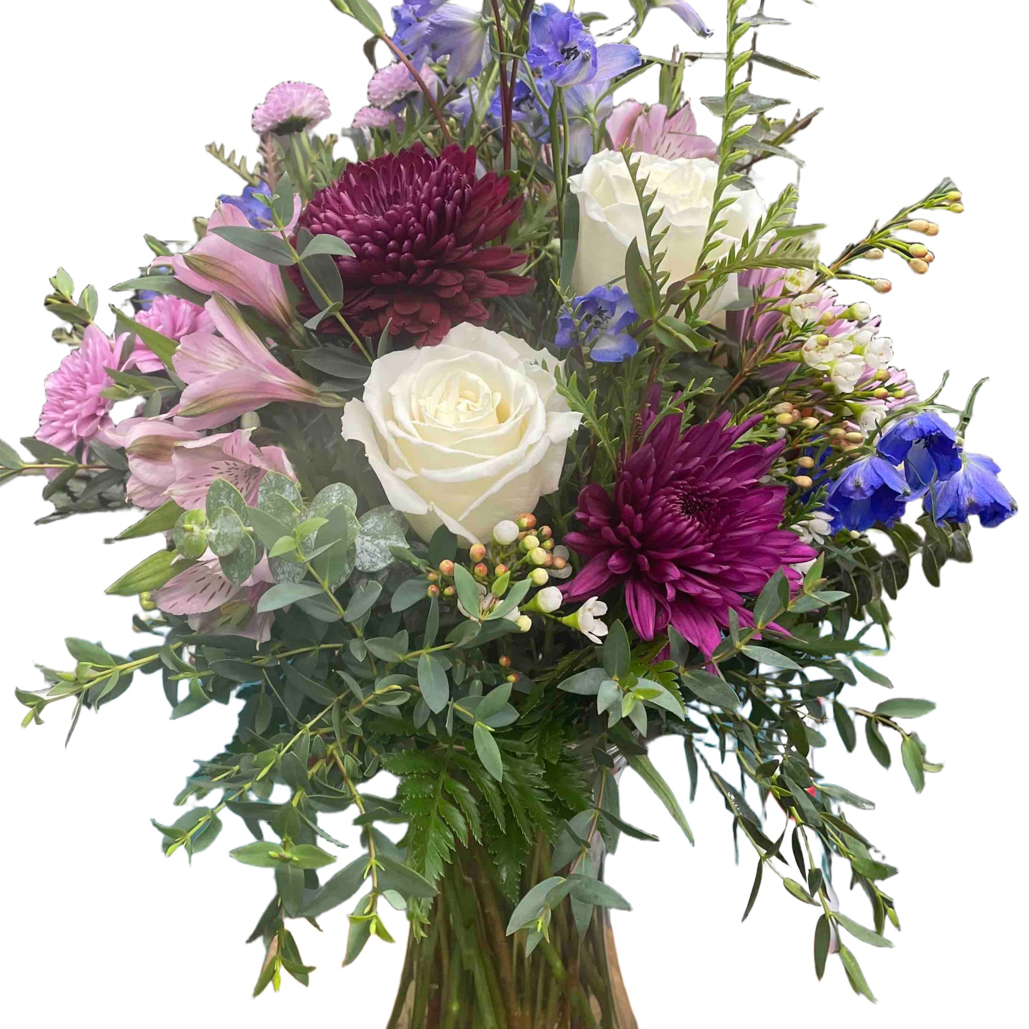 This romantic loose style mix of white roses, blue delphinium, purple chrysanthemums