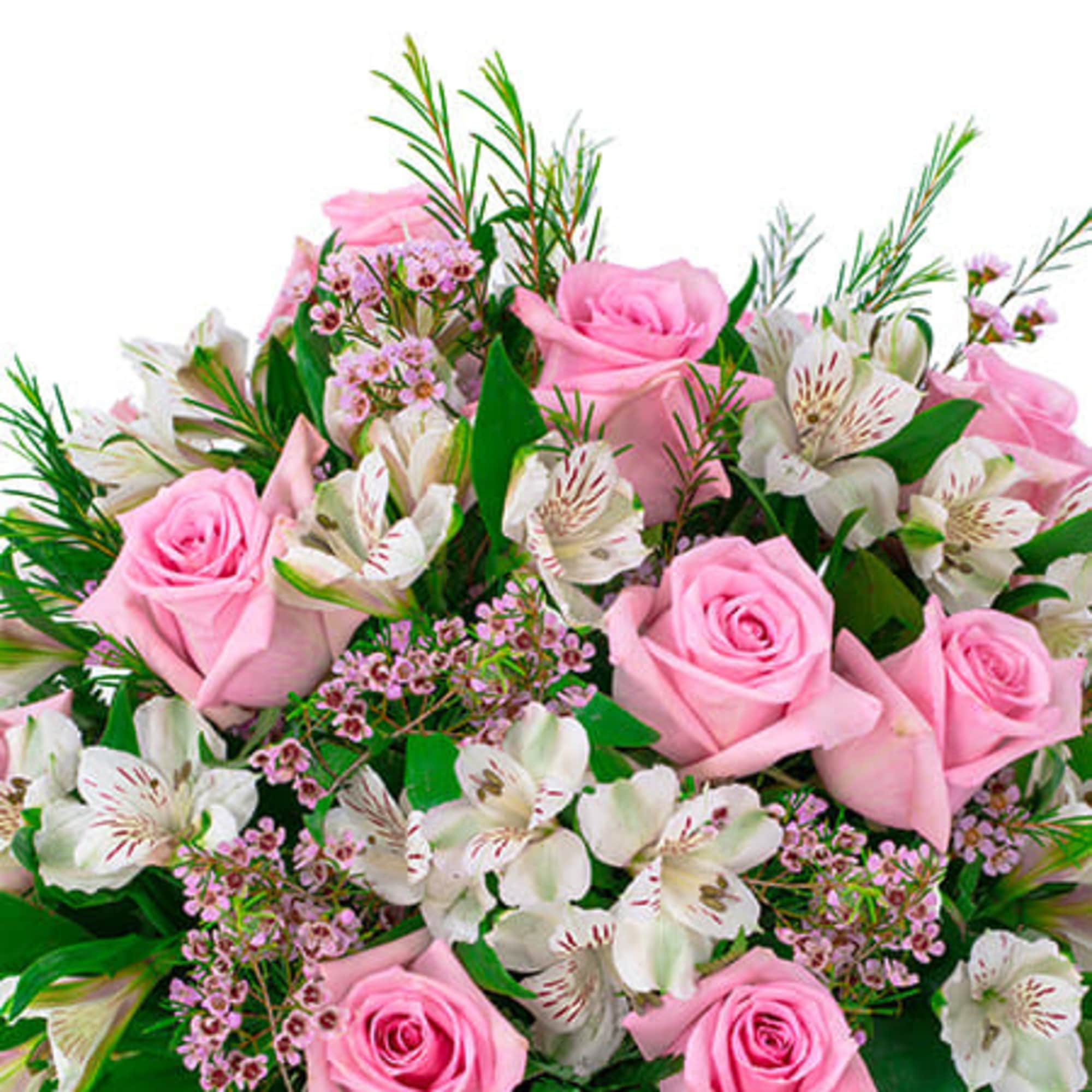 Arrangement of pink roses with white alstroemeria and tiny pink blossoms in a rounded bouquet