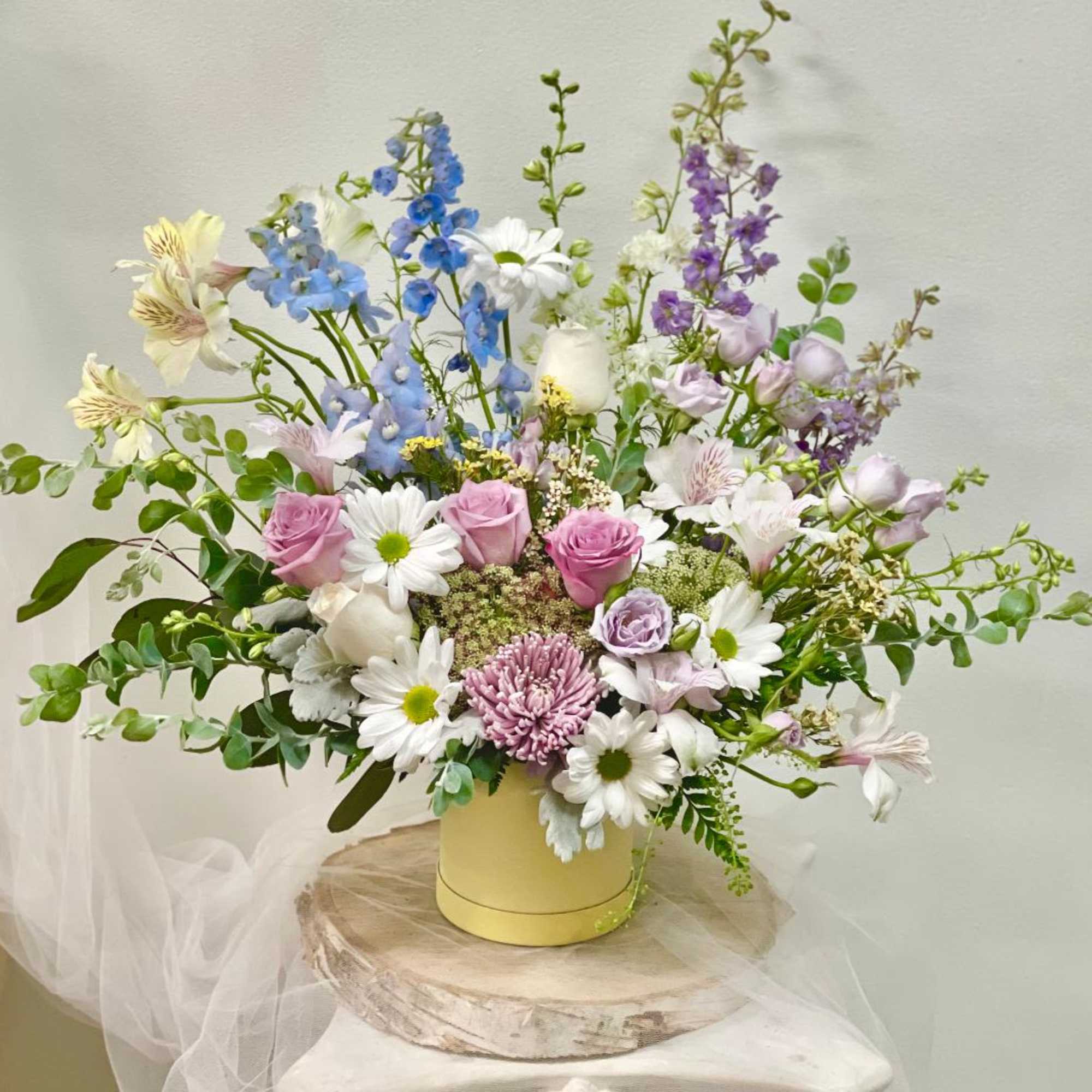 
Product Information
Theme Colors: Pastel peach lavender

Featured Blooms: Roses, Delphinium, Daisy, bloom Tulips