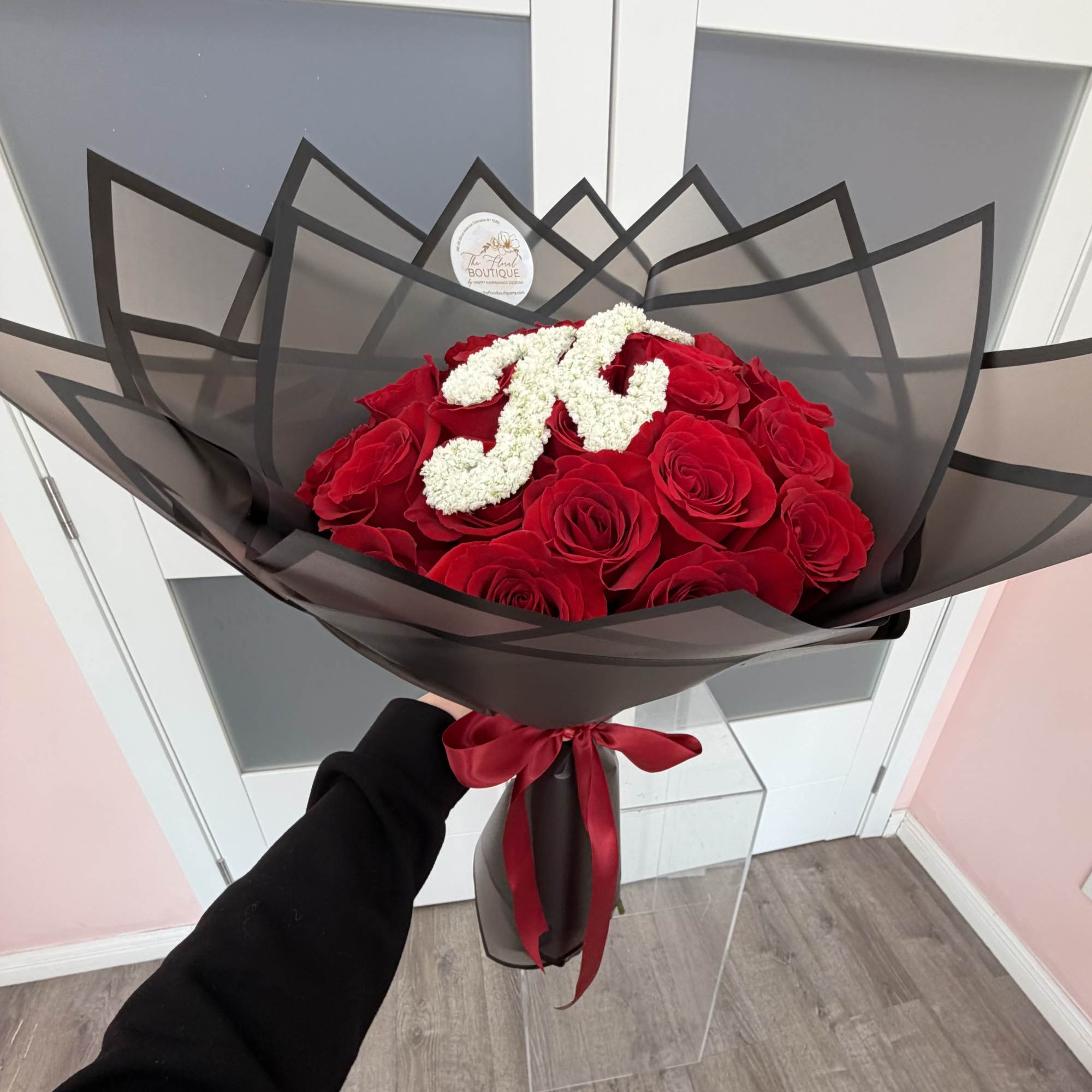 Make a statement with our Initial Love Rose Bouquet, a luxurious arrangement