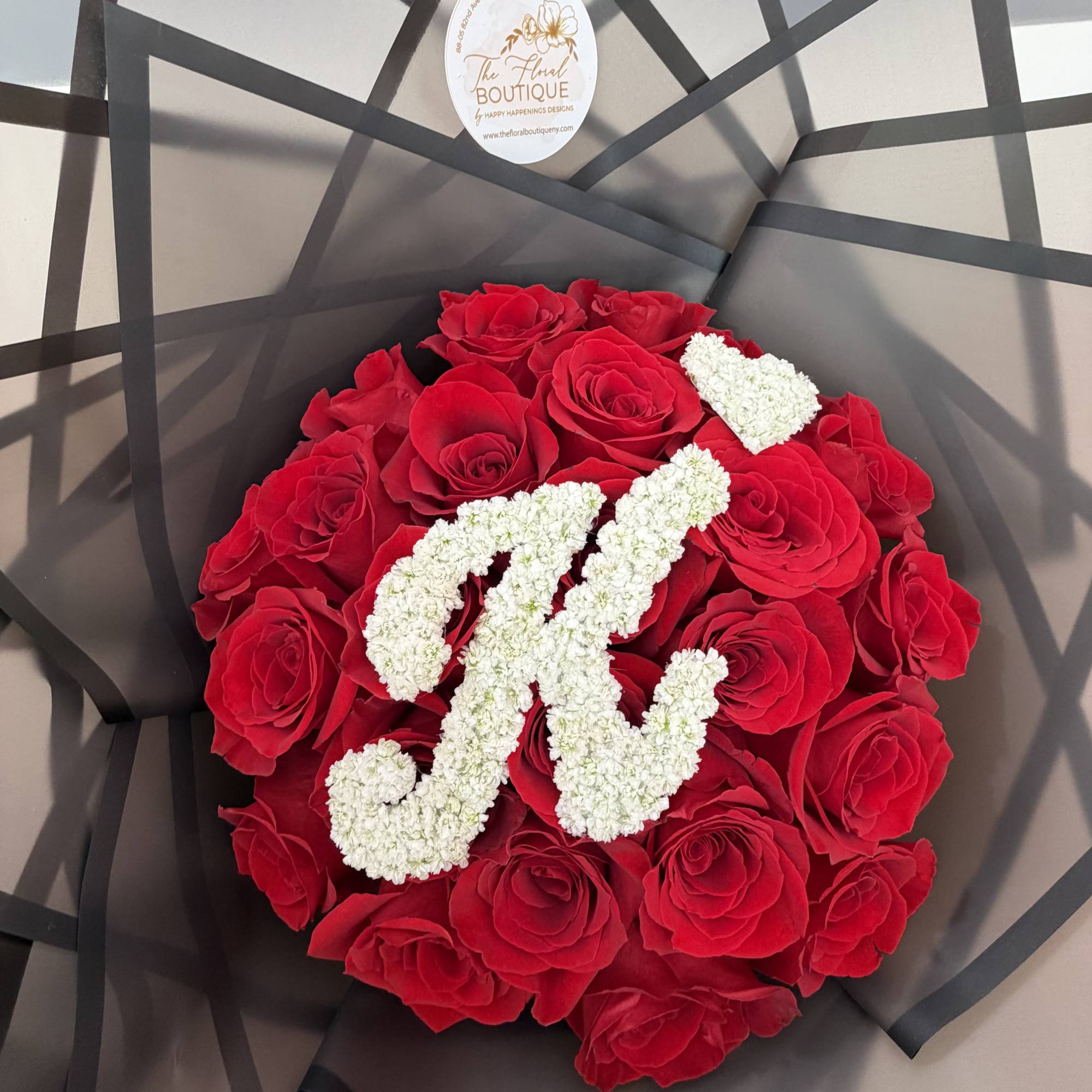 Make a statement with our Initial Love Rose Bouquet, a luxurious arrangement